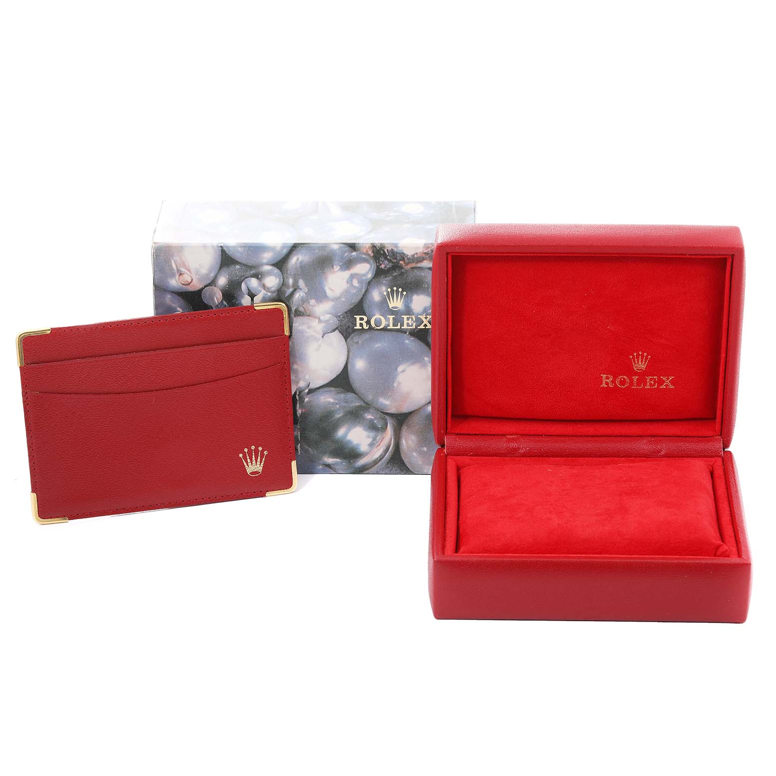 The image shows a Rolex Datejust 79173 Women's Steel and Gold (two tone) Champagne Dial 79173 Women's Steel and Gold (two tone) Champagne Dial watch box, outer box, and a red cardholder, all branded with the Rolex logo.