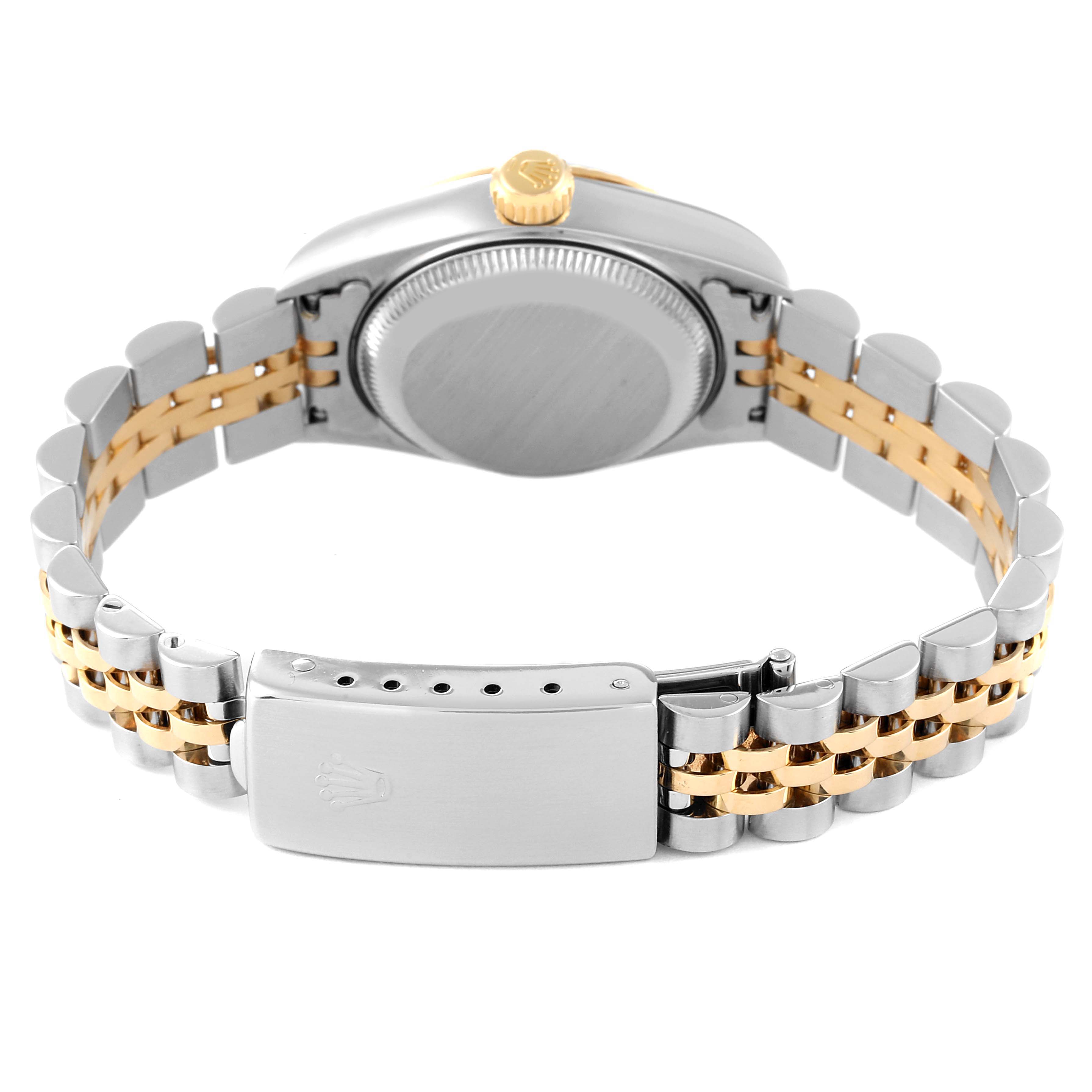The image shows the back case and bracelet of the Rolex Datejust 79173 Women's Steel and Gold (two tone) Champagne Dial 79173 Women's Steel and Gold (two tone) Champagne Dial watch, featuring a two-tone metal design.