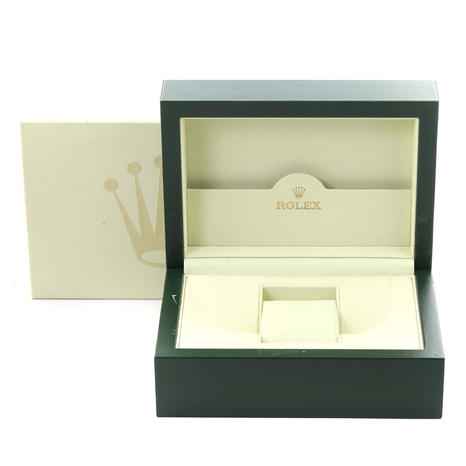 The image shows an open Rolex Datejust 116233 Men
s Steel and Gold (two tone) Champagne Dial 116233 Men
s Steel and Gold (two tone) Champagne Dial watch box from the front, displaying the interior and cushioned space for the watch.