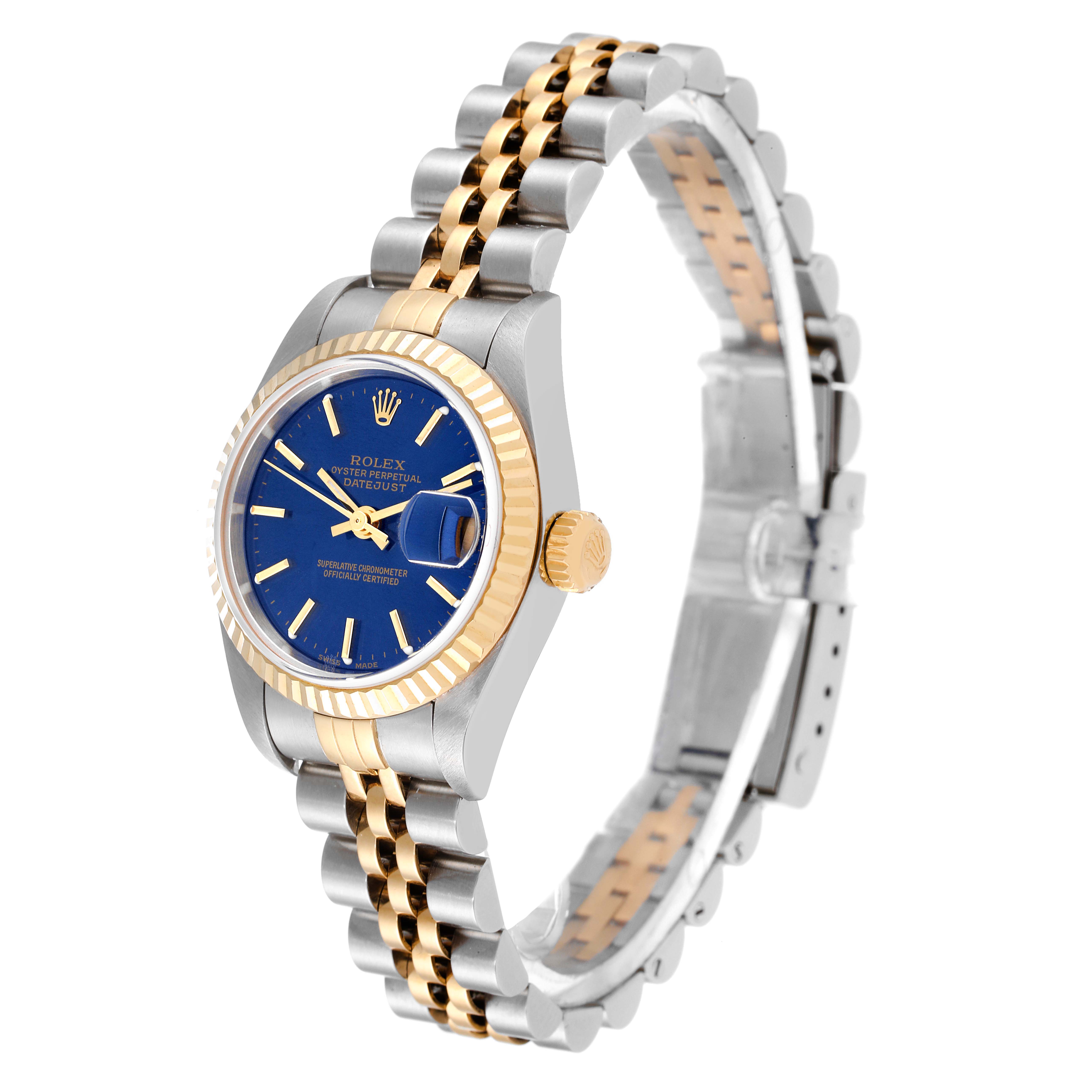 The Rolex Datejust 79173 Women's Steel and Gold (two tone) Blue Dial 79173 Women's Steel and Gold (two tone) Blue Dial watch is shown at an angled side view, highlighting the face, bezel, crown, and two-tone bracelet.