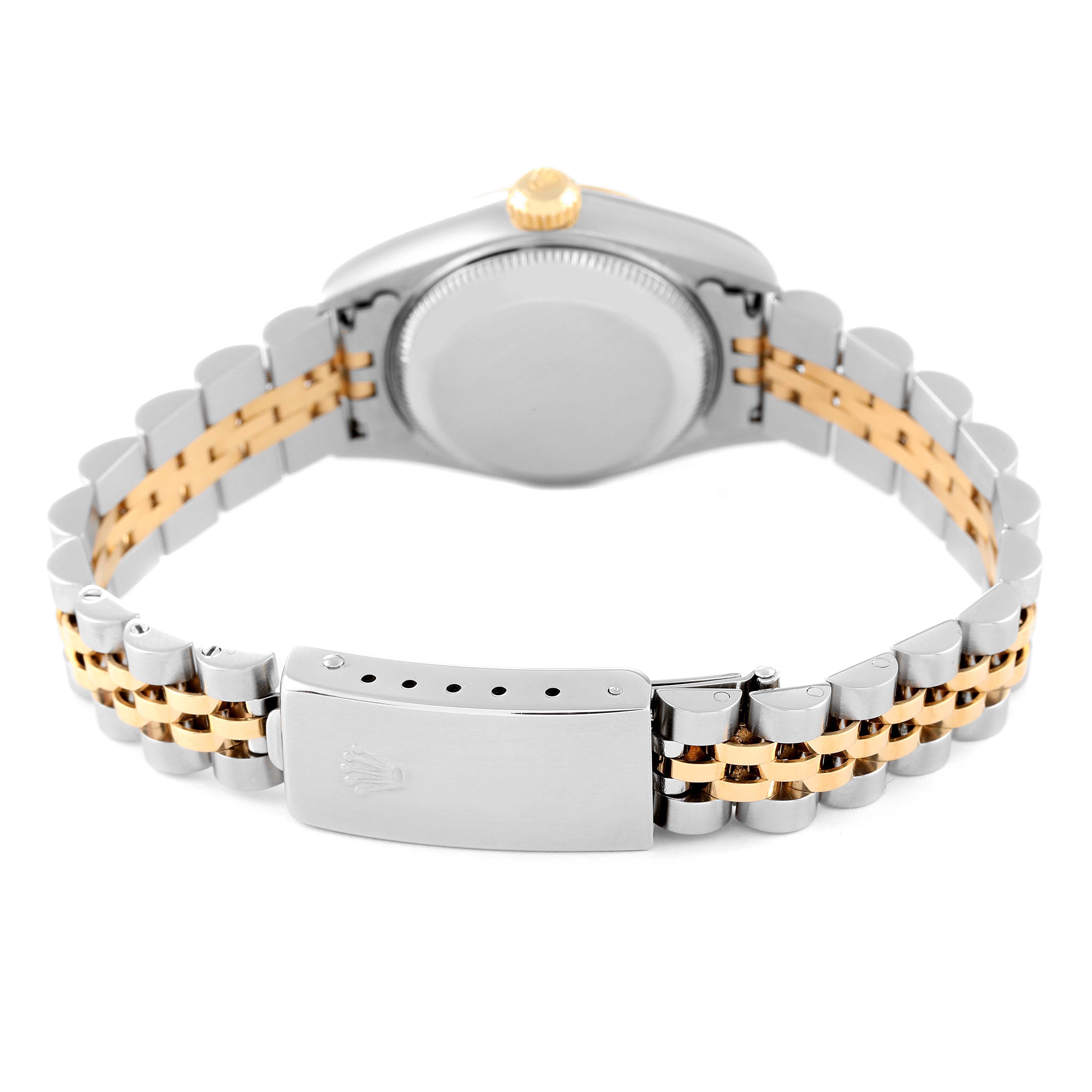 The image shows the back view of a Rolex Datejust 79173 Women's Steel and Gold (two tone) Blue Dial 79173 Women's Steel and Gold (two tone) Blue Dial watch, focusing on its case, crown, and two-tone Jubilee bracelet with a clasp.