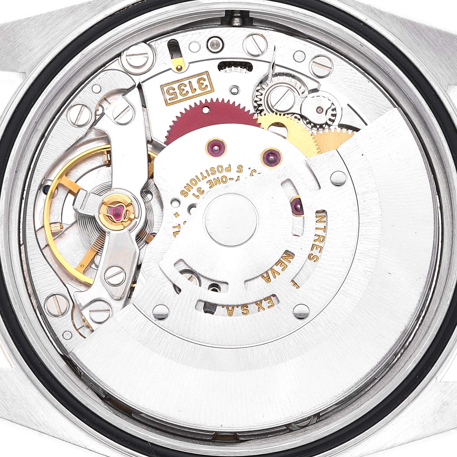 This image shows the internal mechanics and movement of a Rolex Datejust 16233 Men's Steel and Gold (two tone) Mother of Pearl Dial 16233 Men's Steel and Gold (two tone) Mother of Pearl Dial watch from a rear angle.