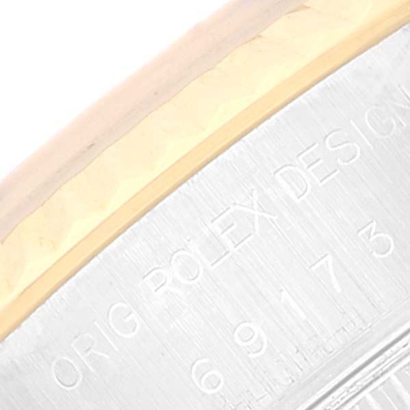 The image shows a close-up of the side bezel and case edge of a Rolex Datejust 69173 Women's Steel and Gold (two tone) White Dial 69173 Women's Steel and Gold (two tone) White Dial model.