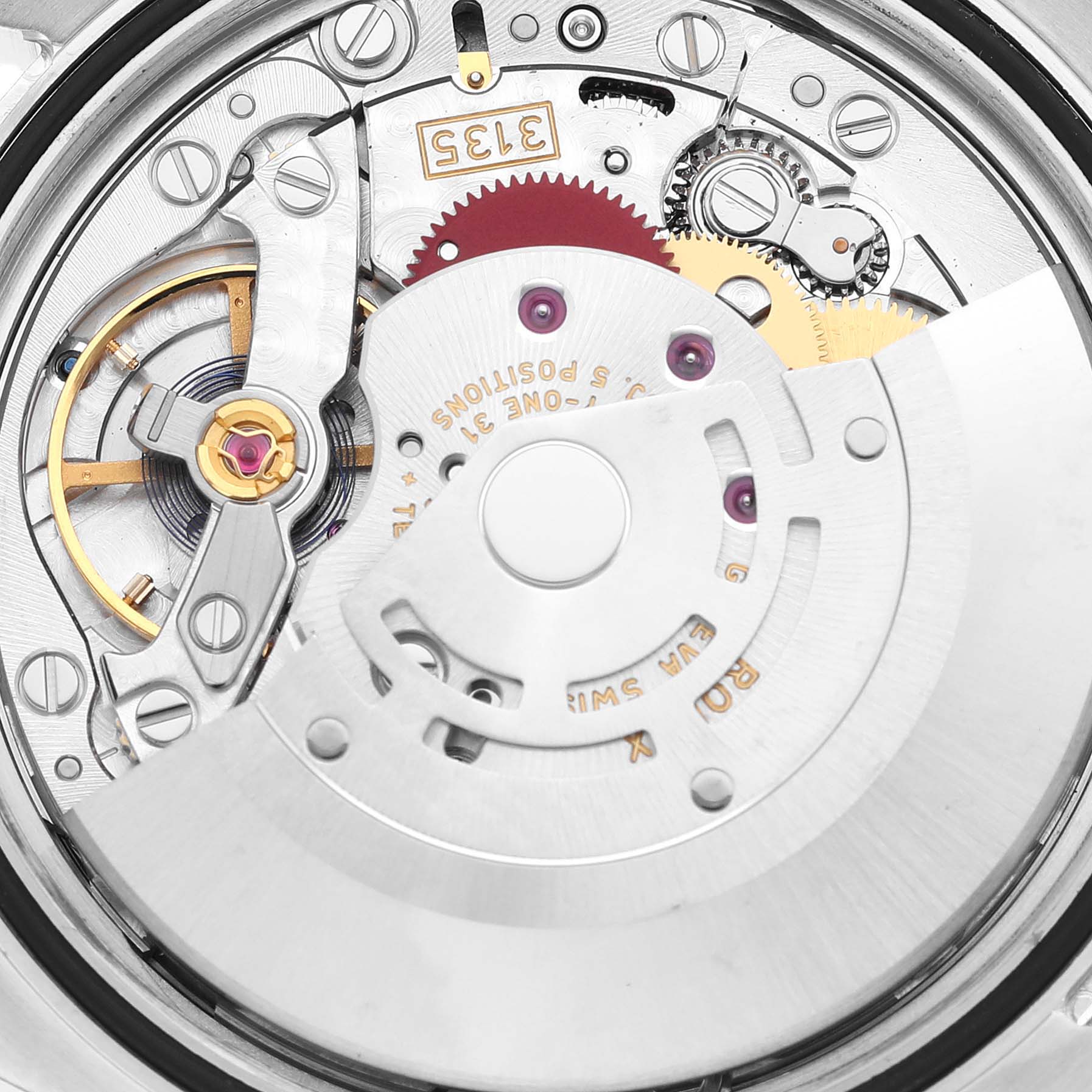 The image shows a close-up view of the movement and internal mechanics of a Rolex Datejust 116200 Men's Stainless Steel White Dial 116200 Men's Stainless Steel White Dial watch.
