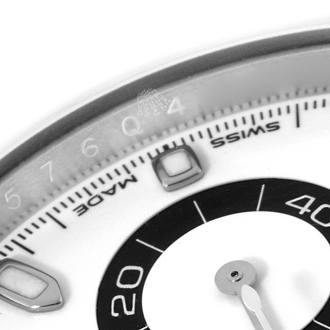 The close-up image shows part of the dial and markers of a Rolex Daytona 116500 Men's Stainless Steel White Dial 116500 Men's Stainless Steel White Dial watch, highlighting the "SWISS MADE" inscription.