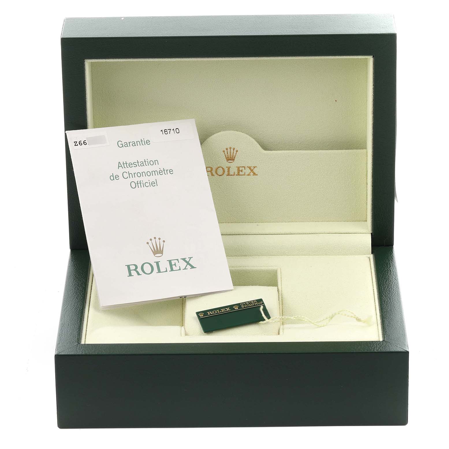 The angle shows the open box for the Rolex GMT-Master 16710 Men's Stainless Steel Black Dial 16710 Men's Stainless Steel Black Dial, with paperwork and a tag included, but no watch visible.