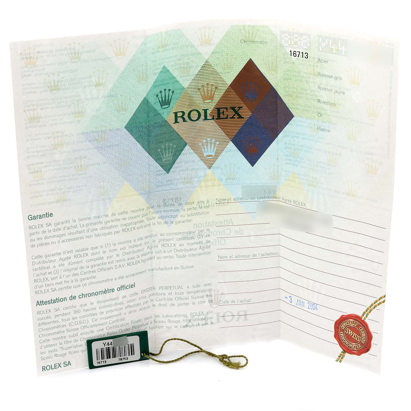 The image shows the warranty card and tag for the Rolex GMT-Master 16713 Men's Steel and Gold (two tone) Brown Dial 16713 Men's Steel and Gold (two tone) Brown Dial model, featuring brand details and a date stamp.