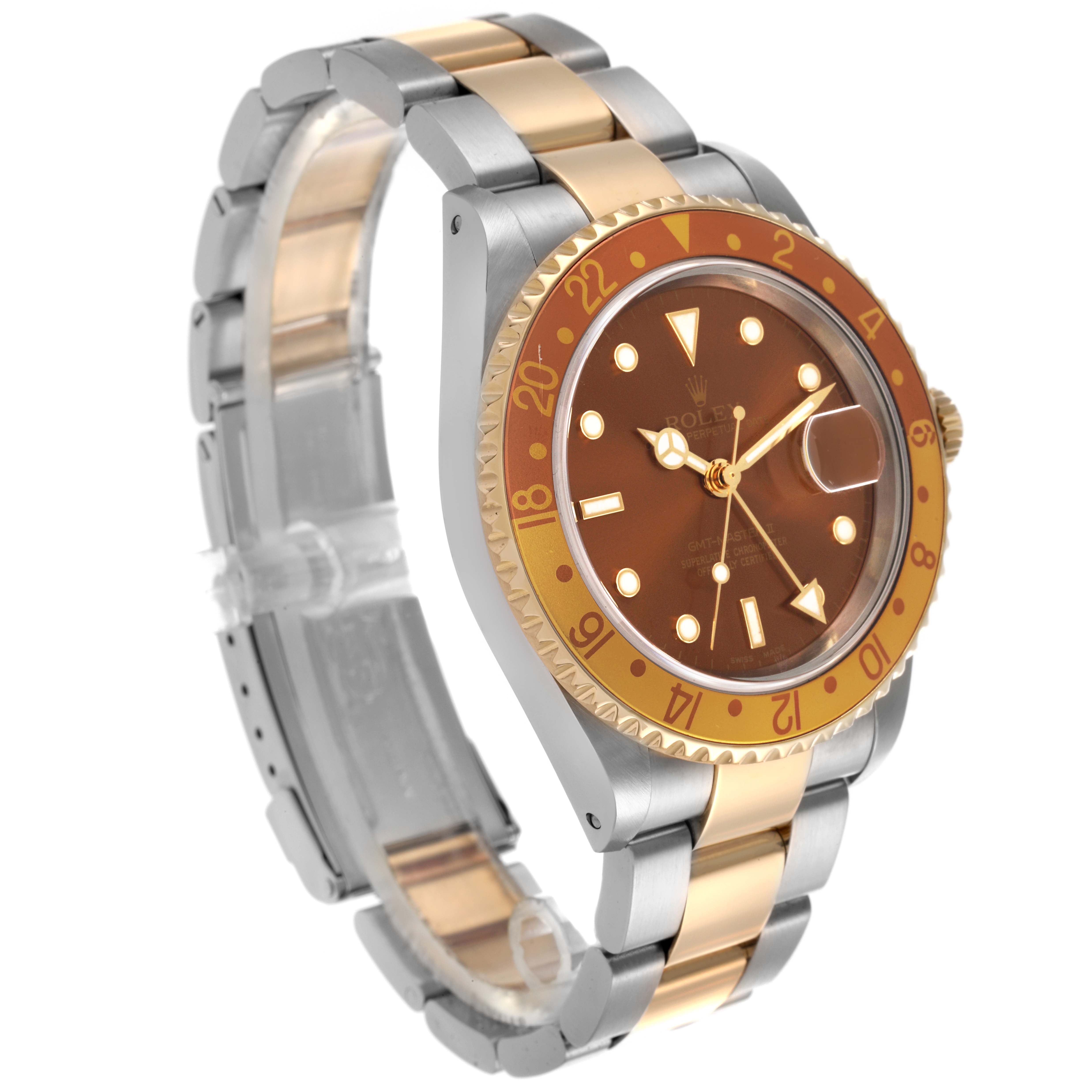 The Rolex GMT-Master 16713 Men's Steel and Gold (two tone) Brown Dial 16713 Men's Steel and Gold (two tone) Brown Dial watch is shown at a three-quarter angle, highlighting its bracelet, bezel, and face.