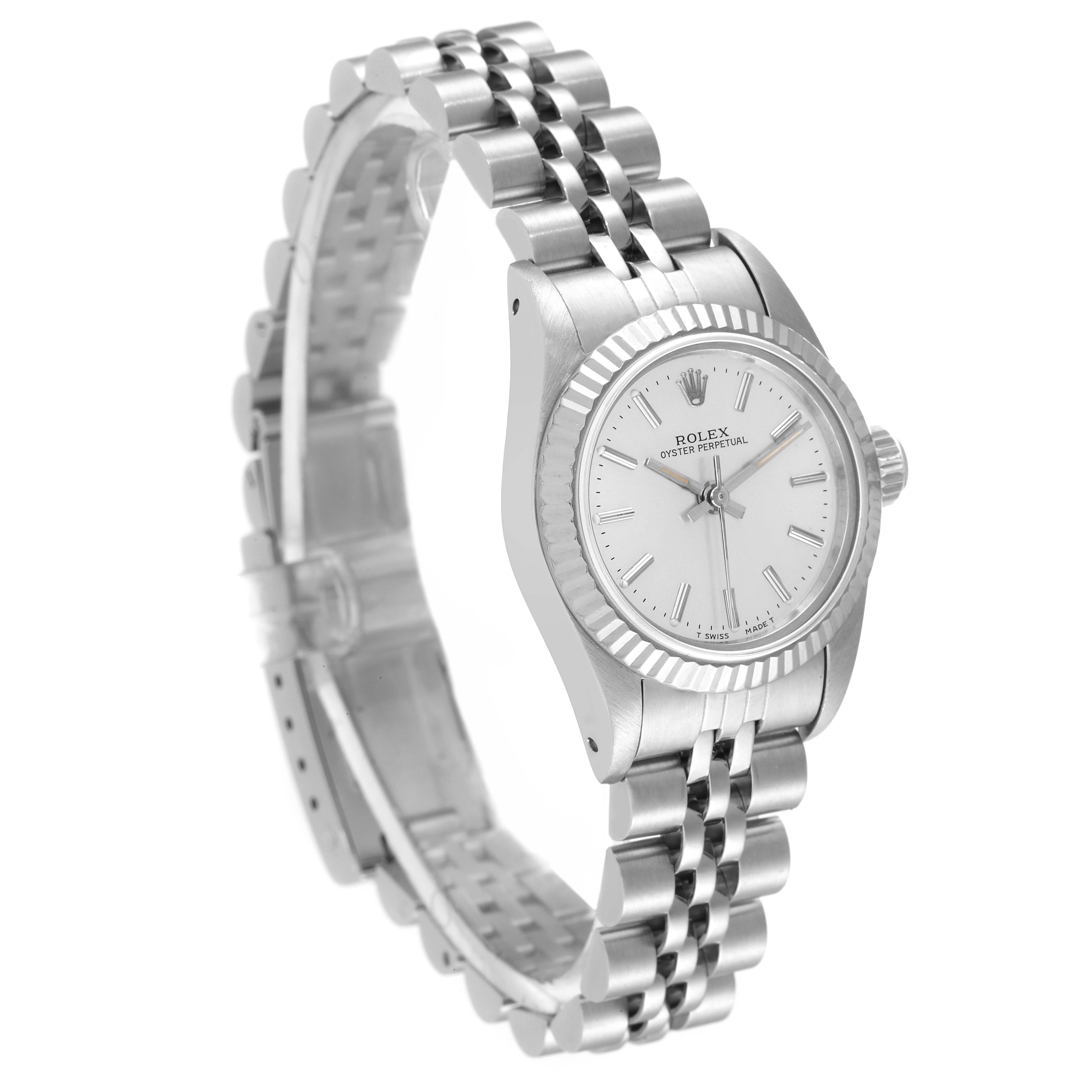 The Rolex Oyster Perpetual 67194 Women
s Stainless Steel Silver Dial 67194 Women
s Stainless Steel Silver Dial watch is shown at a slight angle, displaying the face, bezels, and metal bracelet.