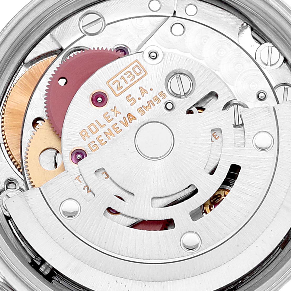 The image shows an internal view of the Rolex Oyster Perpetual 67194 Women
s Stainless Steel Silver Dial 67194 Women
s Stainless Steel Silver Dial watch movement and its intricate components.