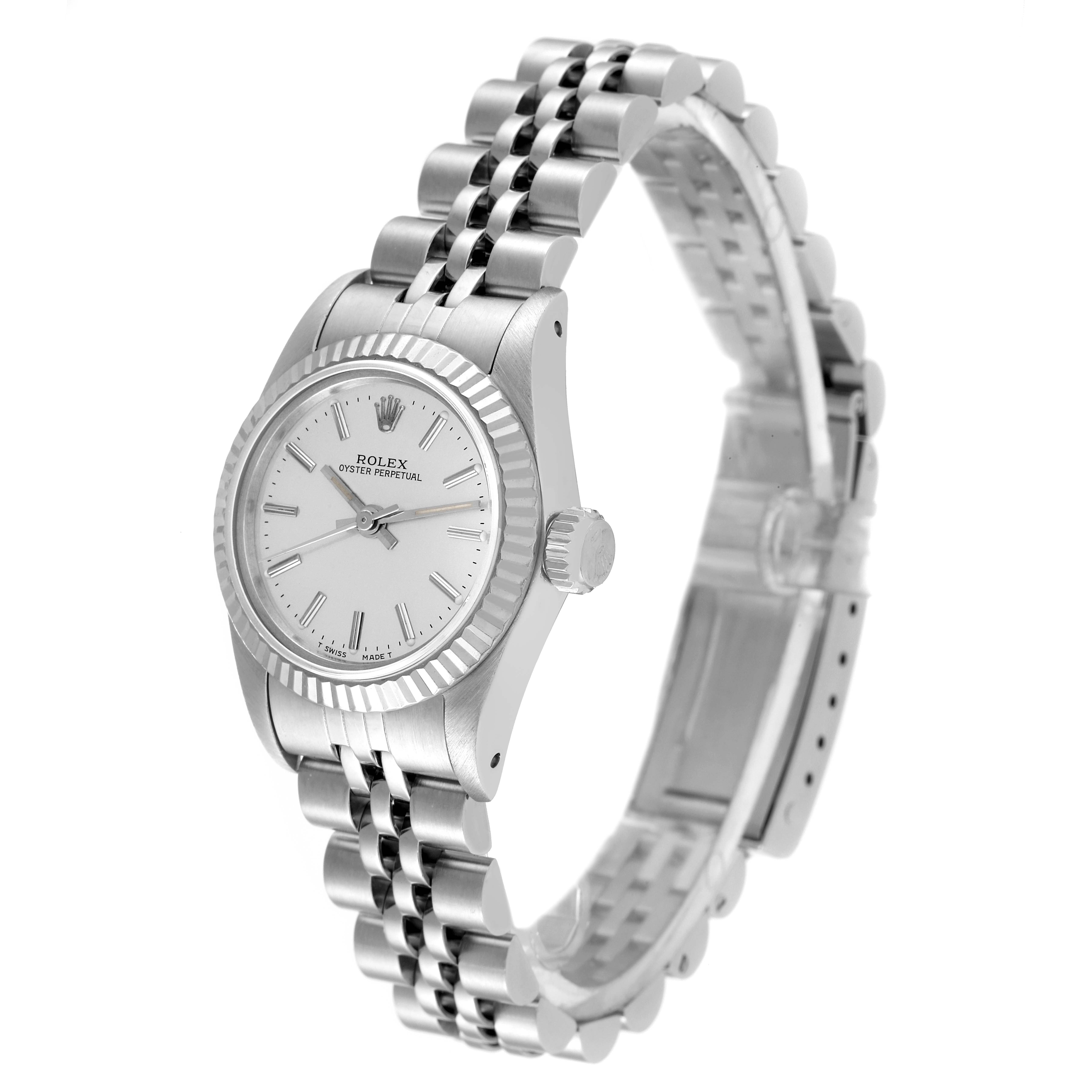 The image shows a side angle of the Rolex Oyster Perpetual 67194 Women
s Stainless Steel Silver Dial 67194 Women
s Stainless Steel Silver Dial watch, featuring the dial, crown, and bracelet.