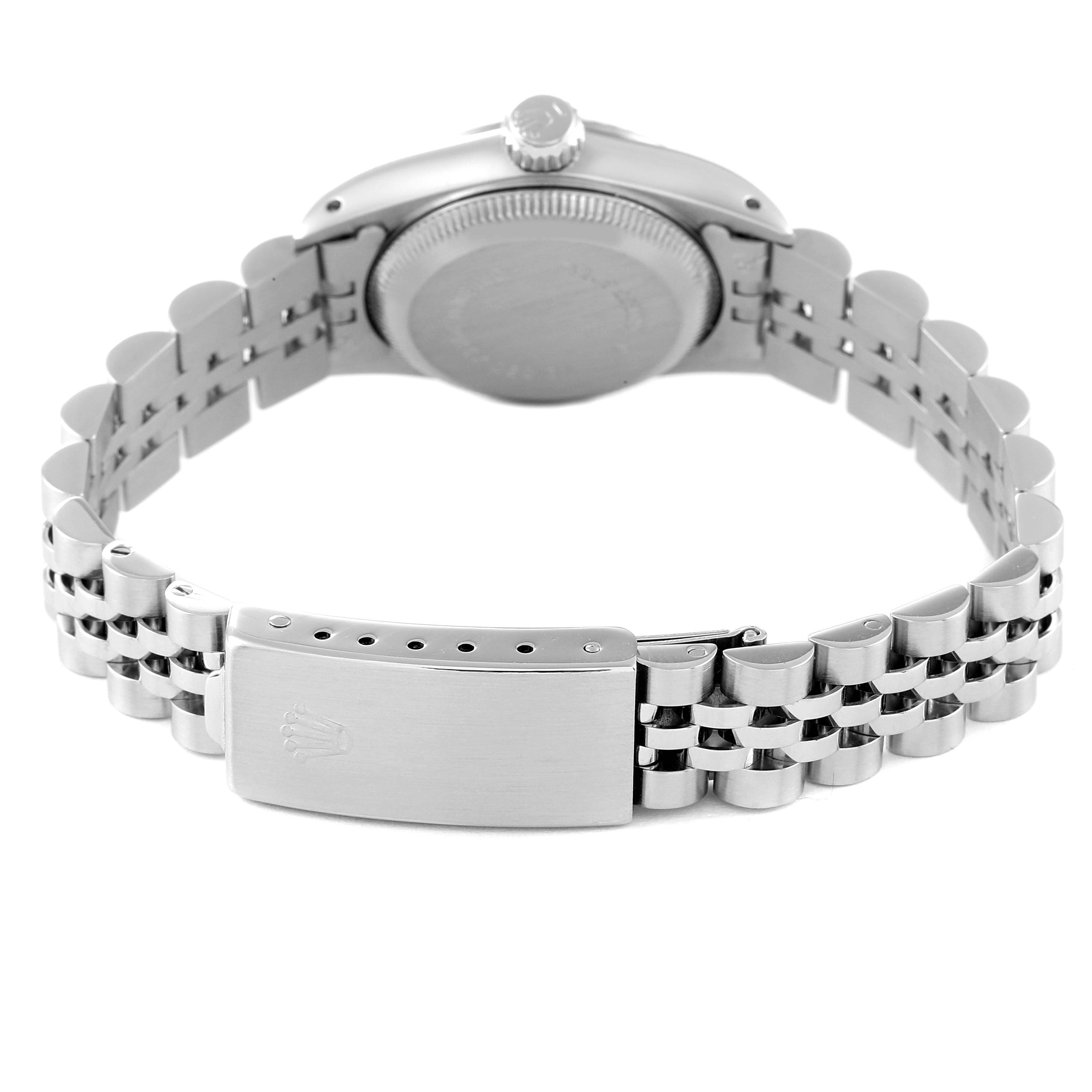 This image of the Rolex Oyster Perpetual 67194 Women
s Stainless Steel Silver Dial 67194 Women
s Stainless Steel Silver Dial watch shows the underside, including the back case, crown, and bracelet with the clasp.