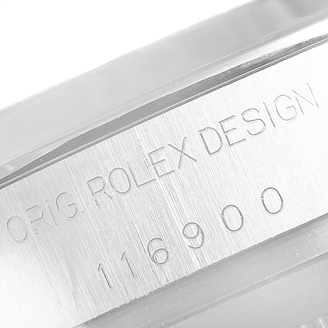 This image shows a close-up of the engraved side of the case of the Rolex Air-King 116900 Men's Stainless Steel Black Dial 116900 Men's Stainless Steel Black Dial watch with "ORIG ROLEX DESIGN 116900."