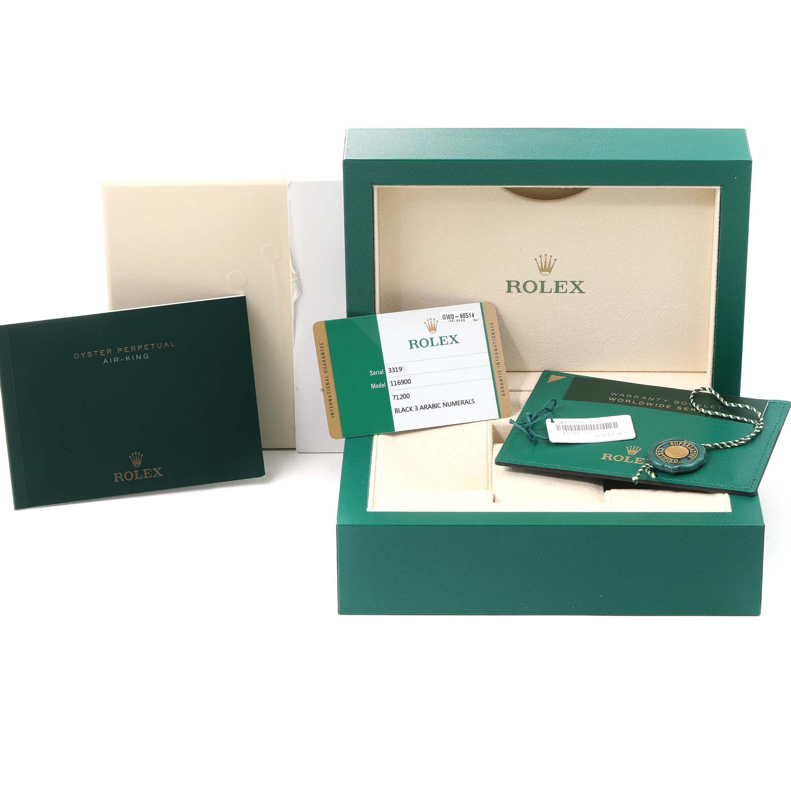 The image shows the packaging and accessories for a Rolex Air-King 116900 Men's Stainless Steel Black Dial 116900 Men's Stainless Steel Black Dial, including the box, booklet, warranty card, and tags.