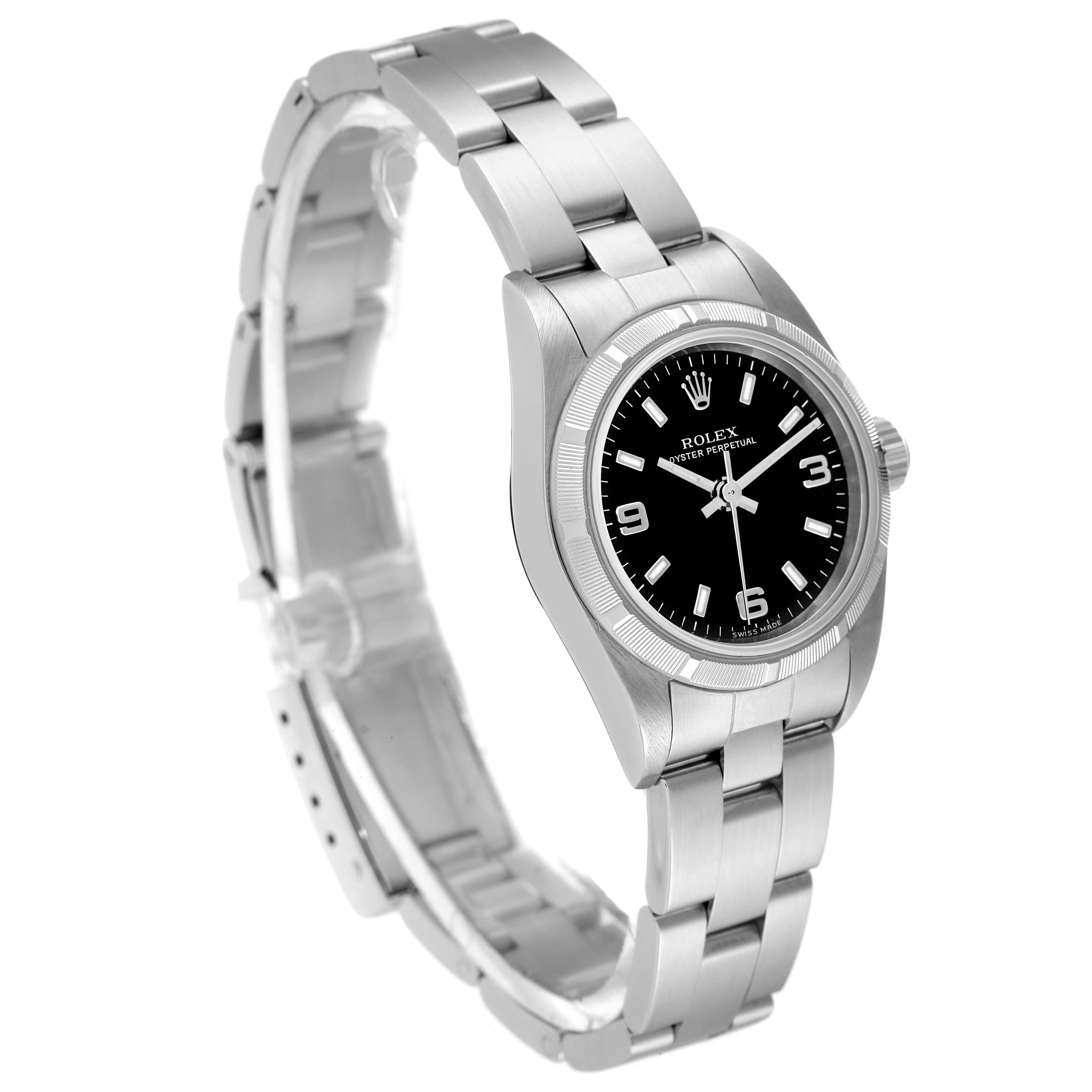 The Rolex Oyster Perpetual 76030 Women's Stainless Steel Black Dial 76030 Women's Stainless Steel Black Dial watch is shown at a slight side angle, displaying the face, bezel, and bracelet.