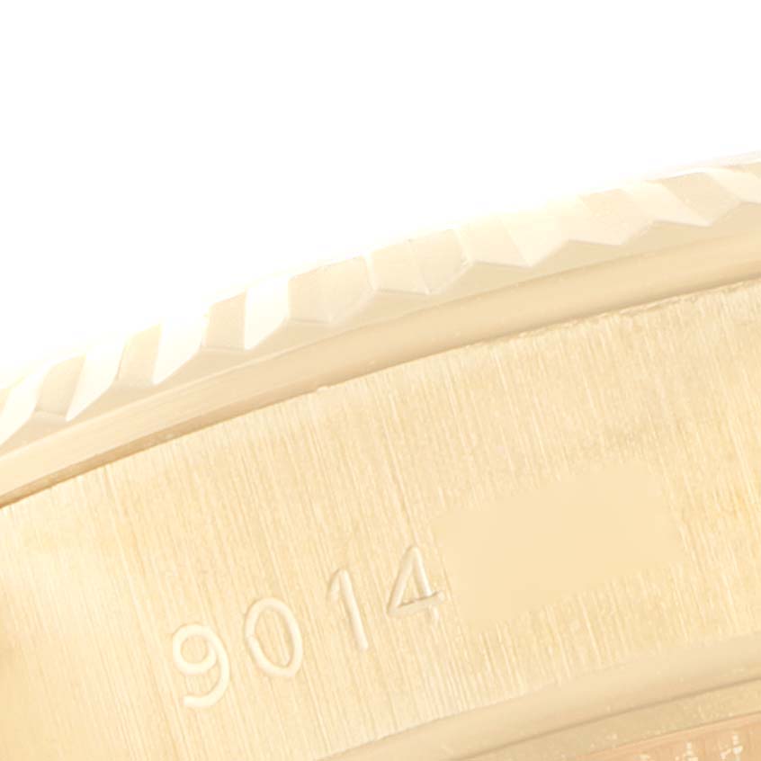 This image shows a close-up angle of the bezel and case side on a Rolex President 69178 Women
s Yellow Gold White Dial 69178 Women
s Yellow Gold White Dial model watch with a partial serial number visible.