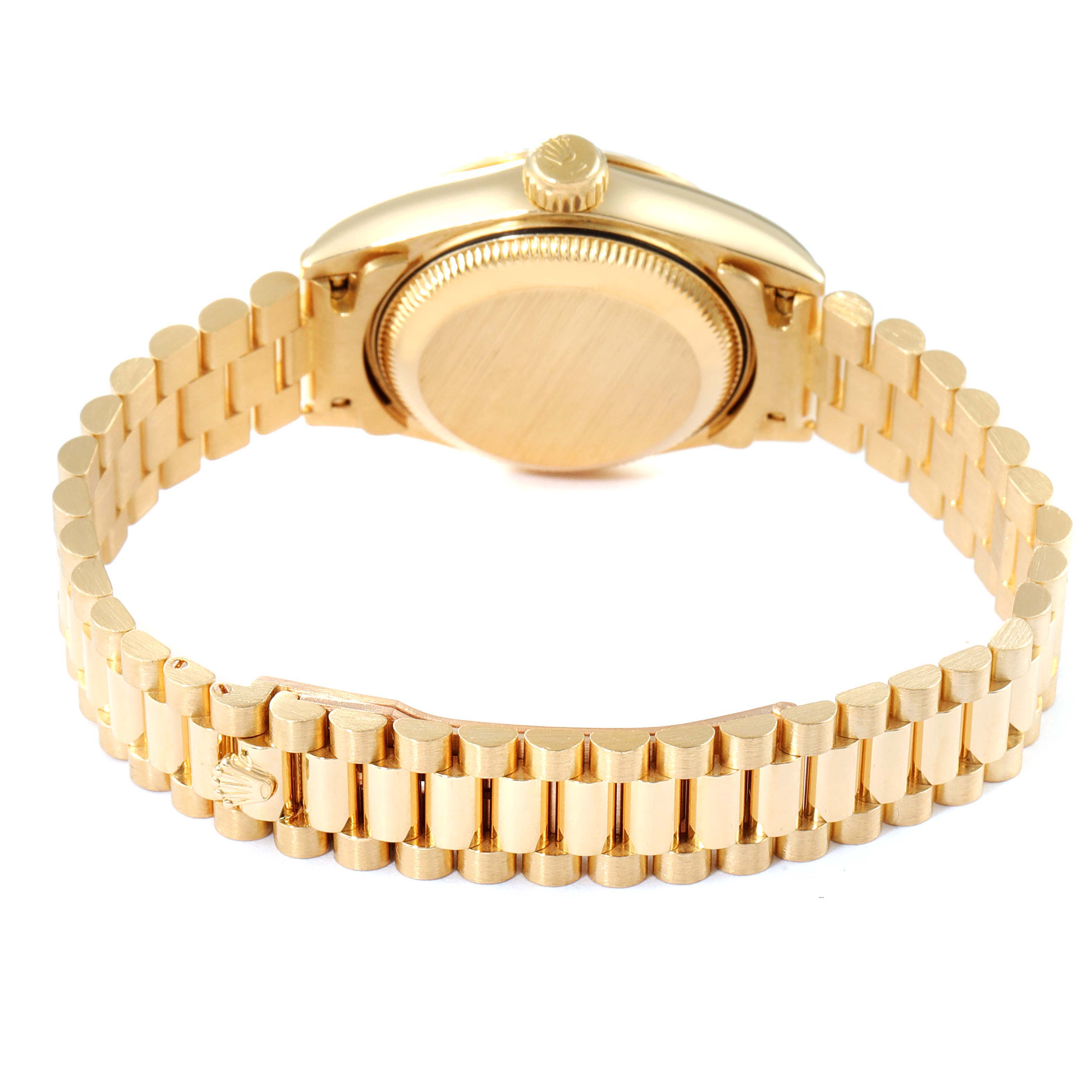 The image shows the back case and the bracelet of a Rolex President 69178 Women
s Yellow Gold White Dial 69178 Women
s Yellow Gold White Dial model watch in a gold finish, viewed from an angled perspective.