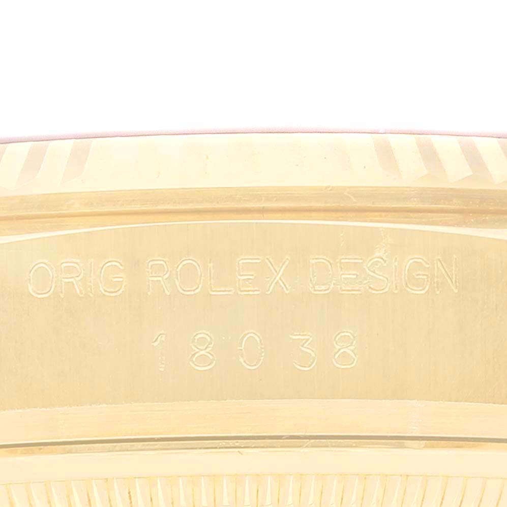 This close-up shows the engraved model number and "ORIG ROLEX DESIGN" text on the President model by Rolex.