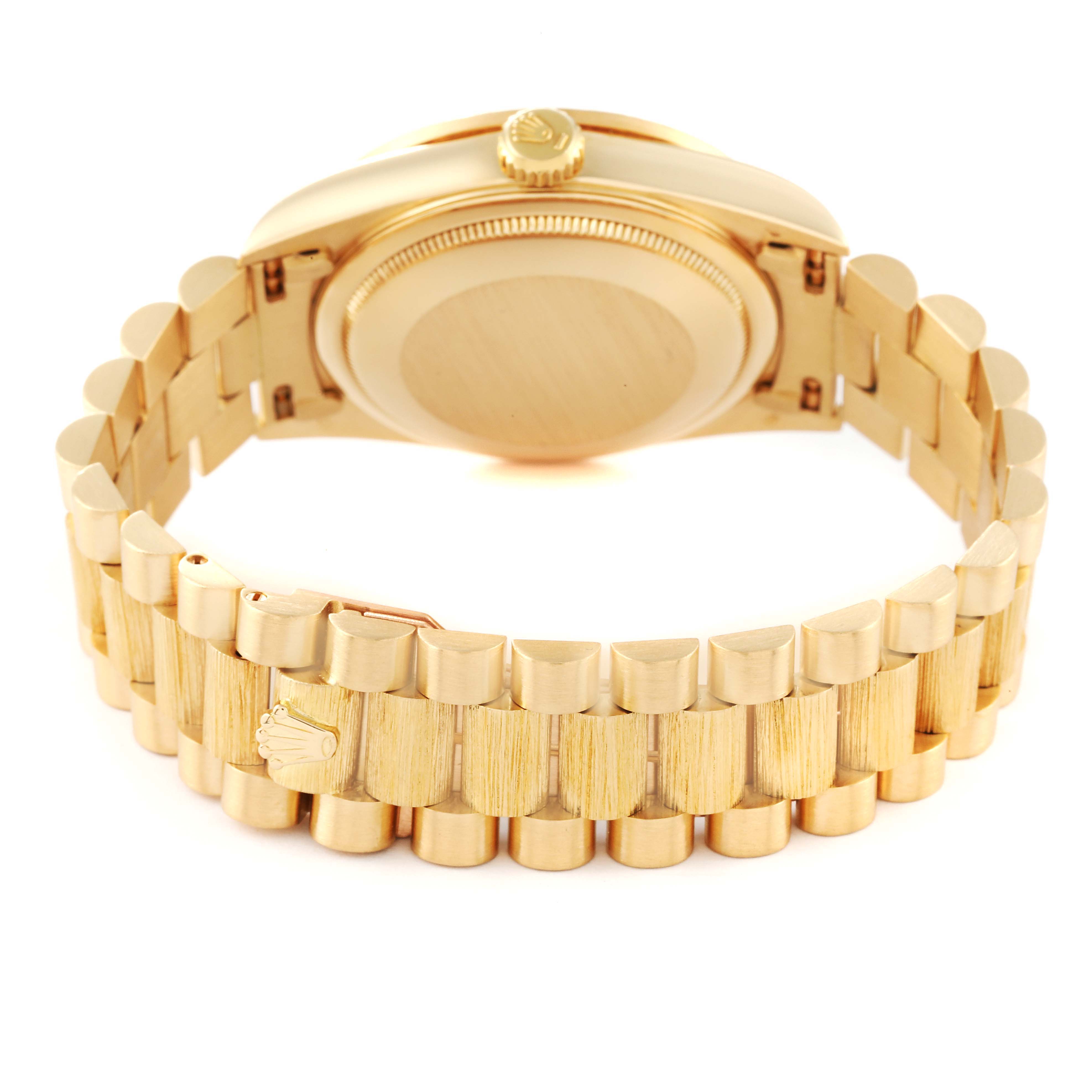 The image shows the back view of the Rolex President 18308 Men's Yellow Gold Champagne Dial 18308 Men's Yellow Gold Champagne Dial model, highlighting the bracelet and case back.