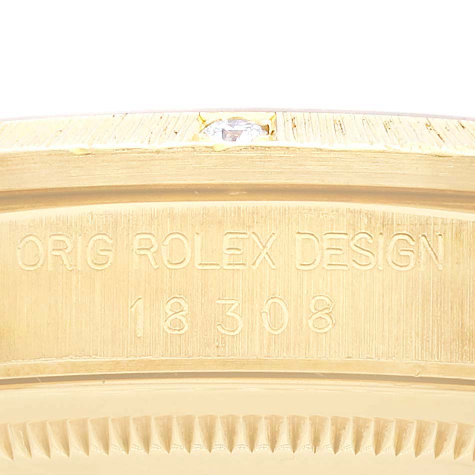 This is a close-up of the engraved model number and design text on the gold case of a Rolex President 18308 Men's Yellow Gold Champagne Dial 18308 Men's Yellow Gold Champagne Dial model watch.