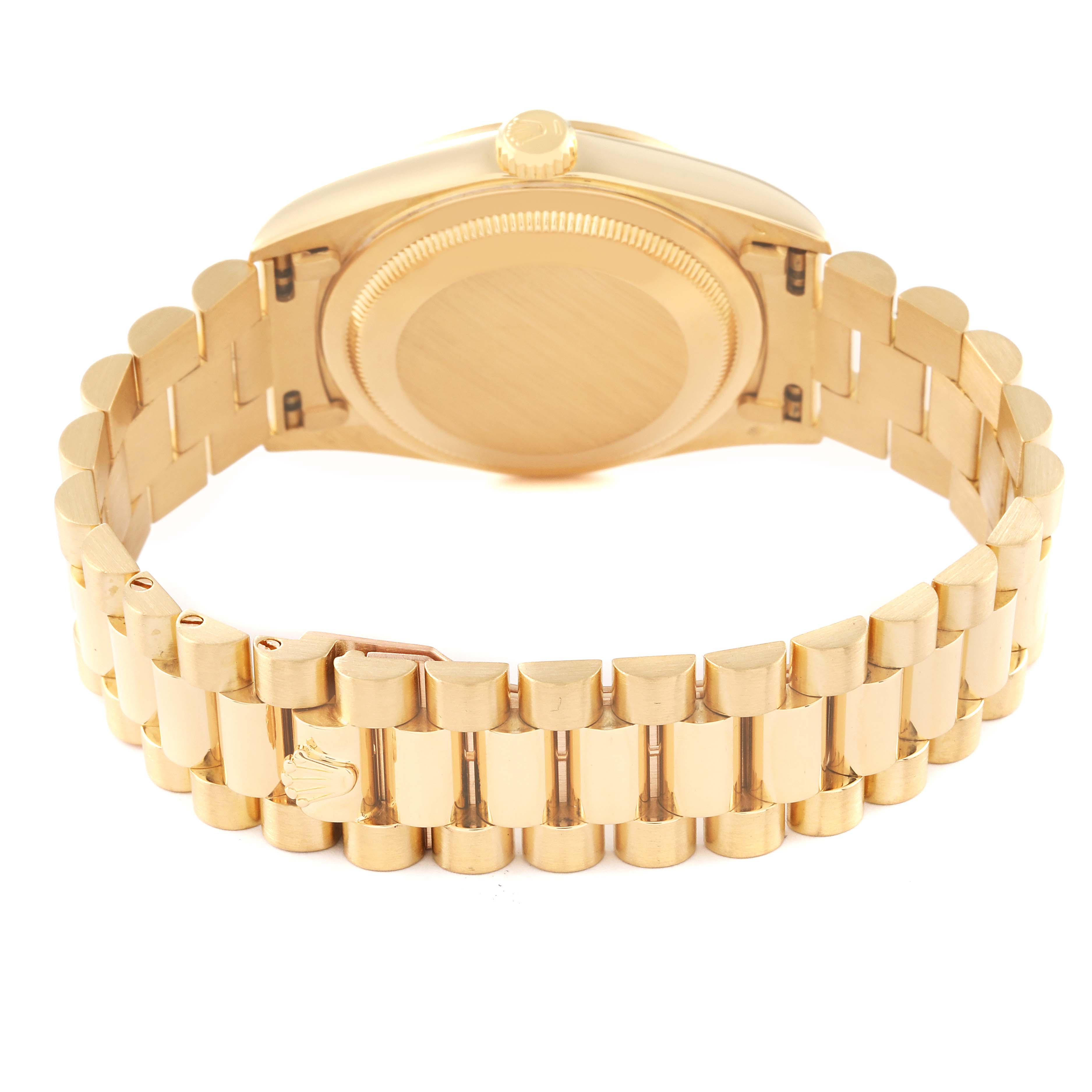 This image shows the back view of a Rolex President 18238 Men
s Yellow Gold Champagne Dial 18238 Men
s Yellow Gold Champagne Dial model watch, including its case back, crown, and bracelet.