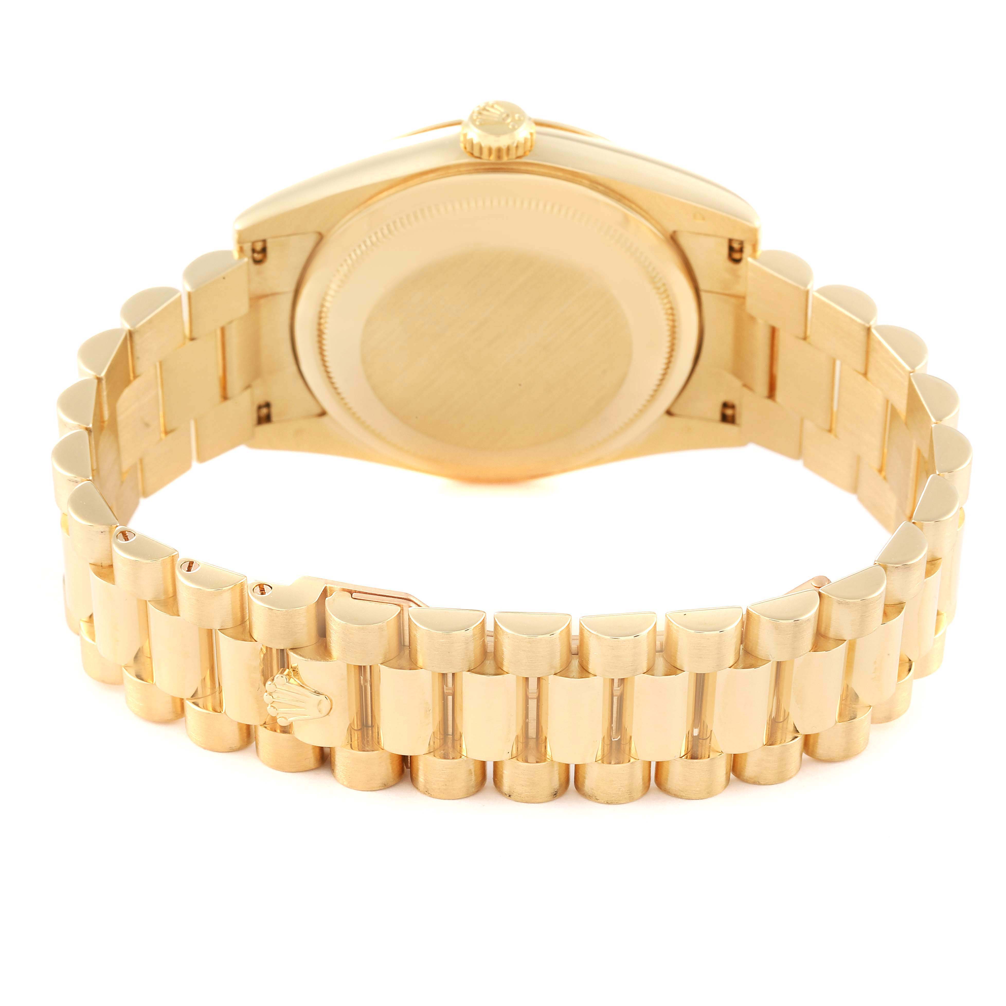 The Rolex President 118238 Men's Yellow Gold Champagne Dial 118238 Men's Yellow Gold Champagne Dial model watch is shown from the back, highlighting its bracelet and case back.