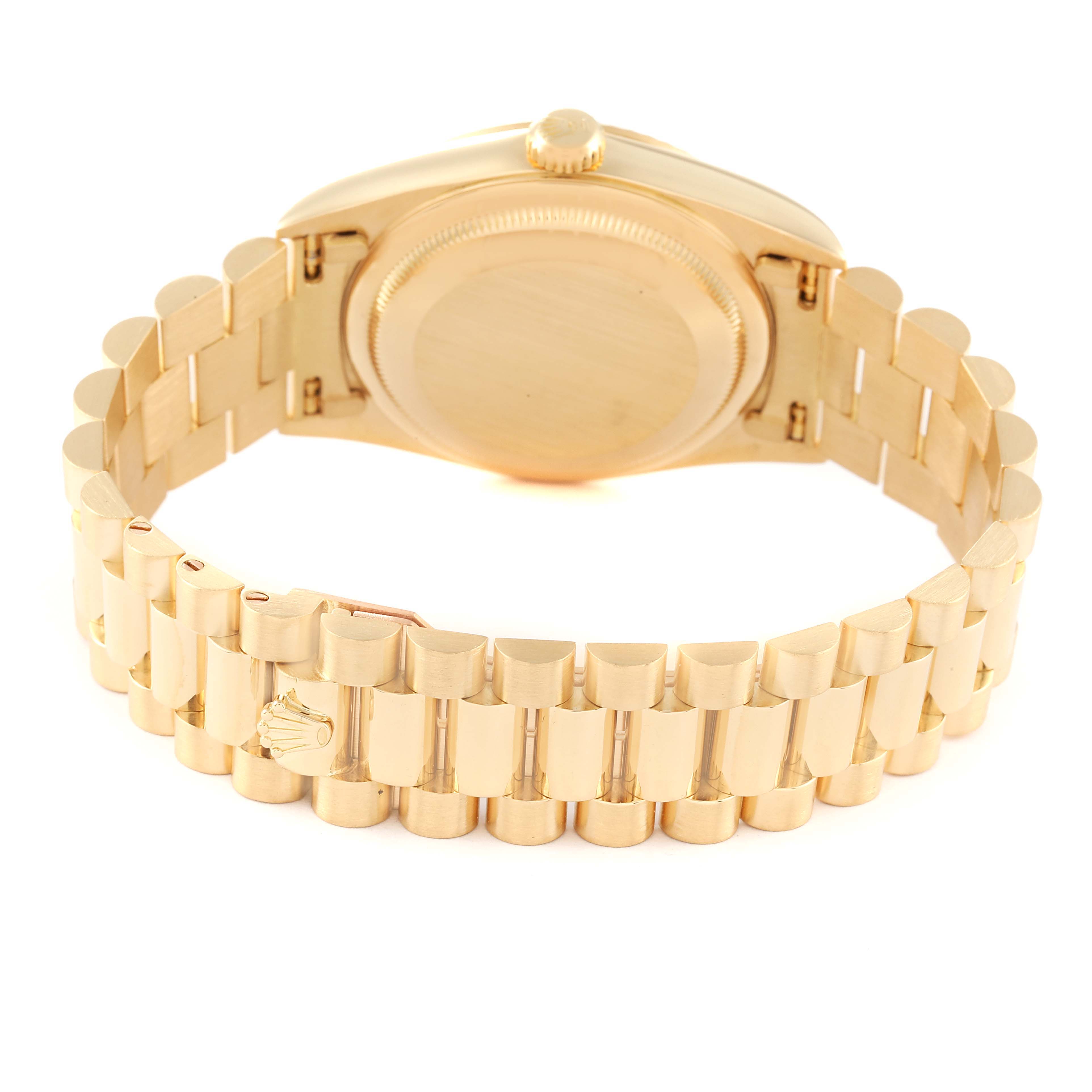 This image shows the back of a Rolex President 18238 Men's Yellow Gold Mother of Pearl Dial 18238 Men's Yellow Gold Mother of Pearl Dial watch, highlighting the case back and the gold bracelet with the iconic Rolex emblem.