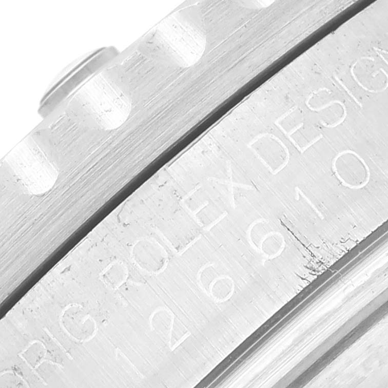 This image shows a close-up of the edge of the bezel and the engraved serial on the case of a Rolex Submariner 126610LN Men
s Stainless Steel Black Dial 126610LN Men
s Stainless Steel Black Dial watch.