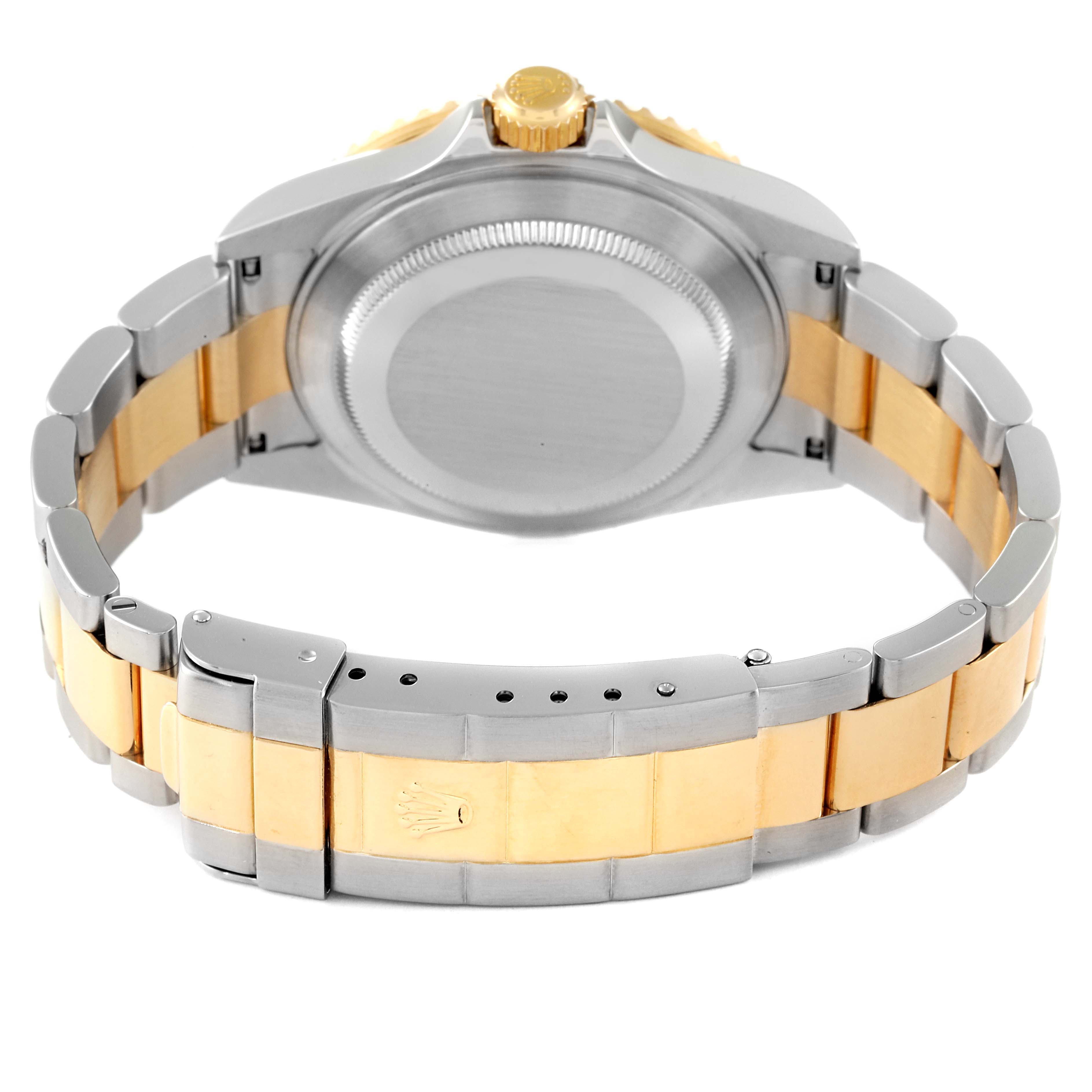 The image shows the back view of a Rolex Submariner 16613 Men's Steel and Gold (two tone) Blue Dial 16613 Men's Steel and Gold (two tone) Blue Dial watch, highlighting its two-tone bracelet, clasp, and case back.