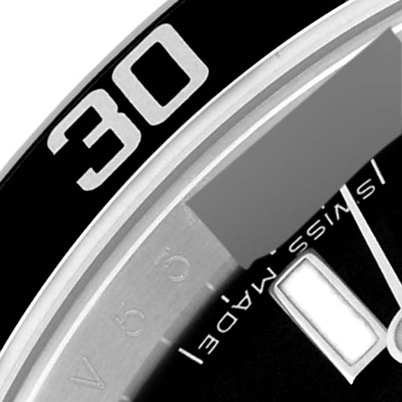 This close-up shows a partial view of the bezel set at 30, the dial with "Swiss Made," and a marker of the Rolex Submariner 14060 Men
s Stainless Steel Black Dial 14060 Men
s Stainless Steel Black Dial watch.
