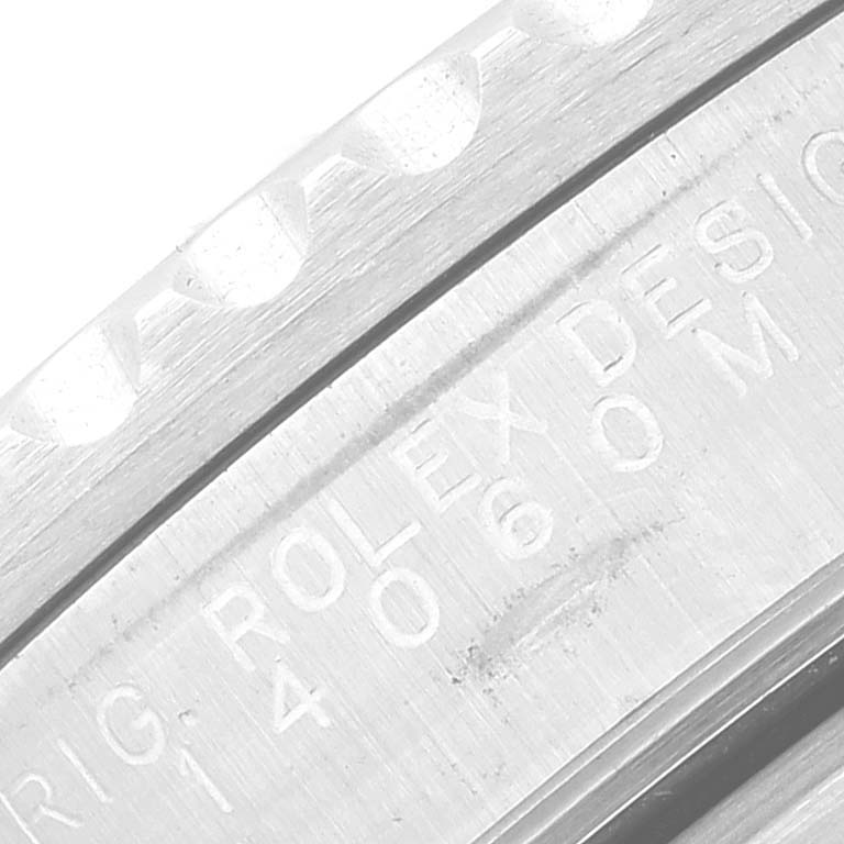 This is a close-up of the bezel and engraved model number on a Rolex Submariner 14060 Men
s Stainless Steel Black Dial 14060 Men
s Stainless Steel Black Dial.