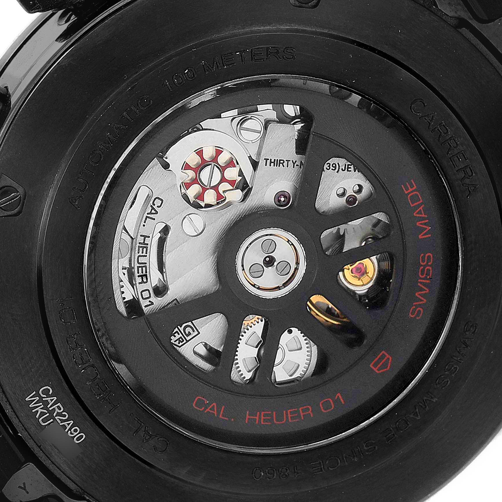 The image shows the back view of a Tag Heuer Carrera CAR2A90.FT6071 Men's Ceramic Black Dial CAR2A90.FT6071 Men's Ceramic Black Dial watch, revealing the Cal. Heuer 01 automatic movement.