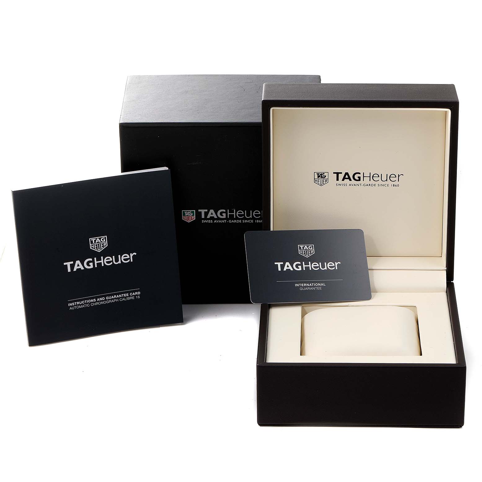 The image shows the Tag Heuer Carrera CV2A1V.BA0738 Men
s Stainless Steel Blue Dial CV2A1V.BA0738 Men
s Stainless Steel Blue Dial watch box, instruction manual, and international guarantee card.