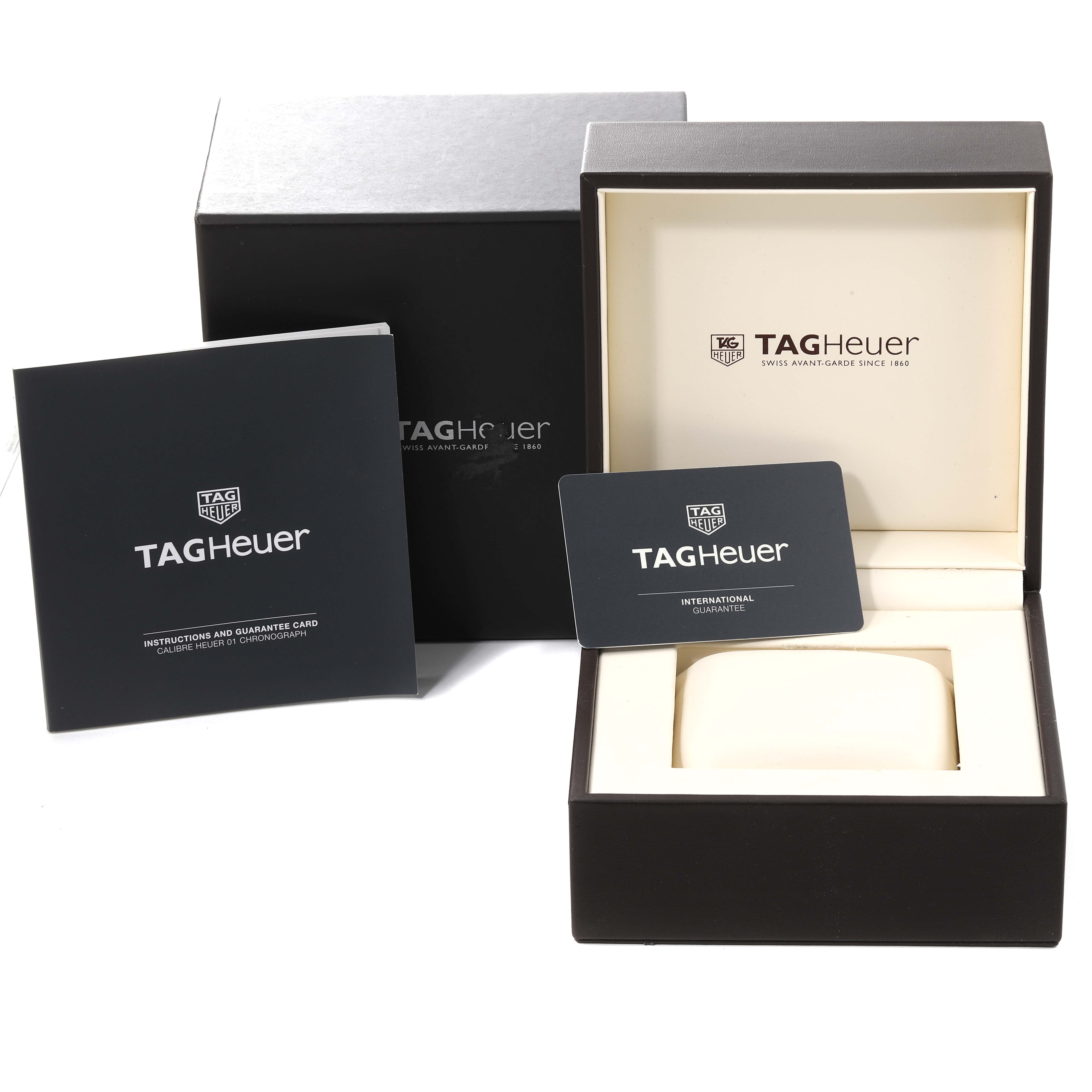 The image shows the box, instruction manual, and warranty card for a Tag Heuer Carrera CAR201V.BA0714 Men's Stainless Steel Transparent Dial CAR201V.BA0714 Men's Stainless Steel Transparent Dial watch.