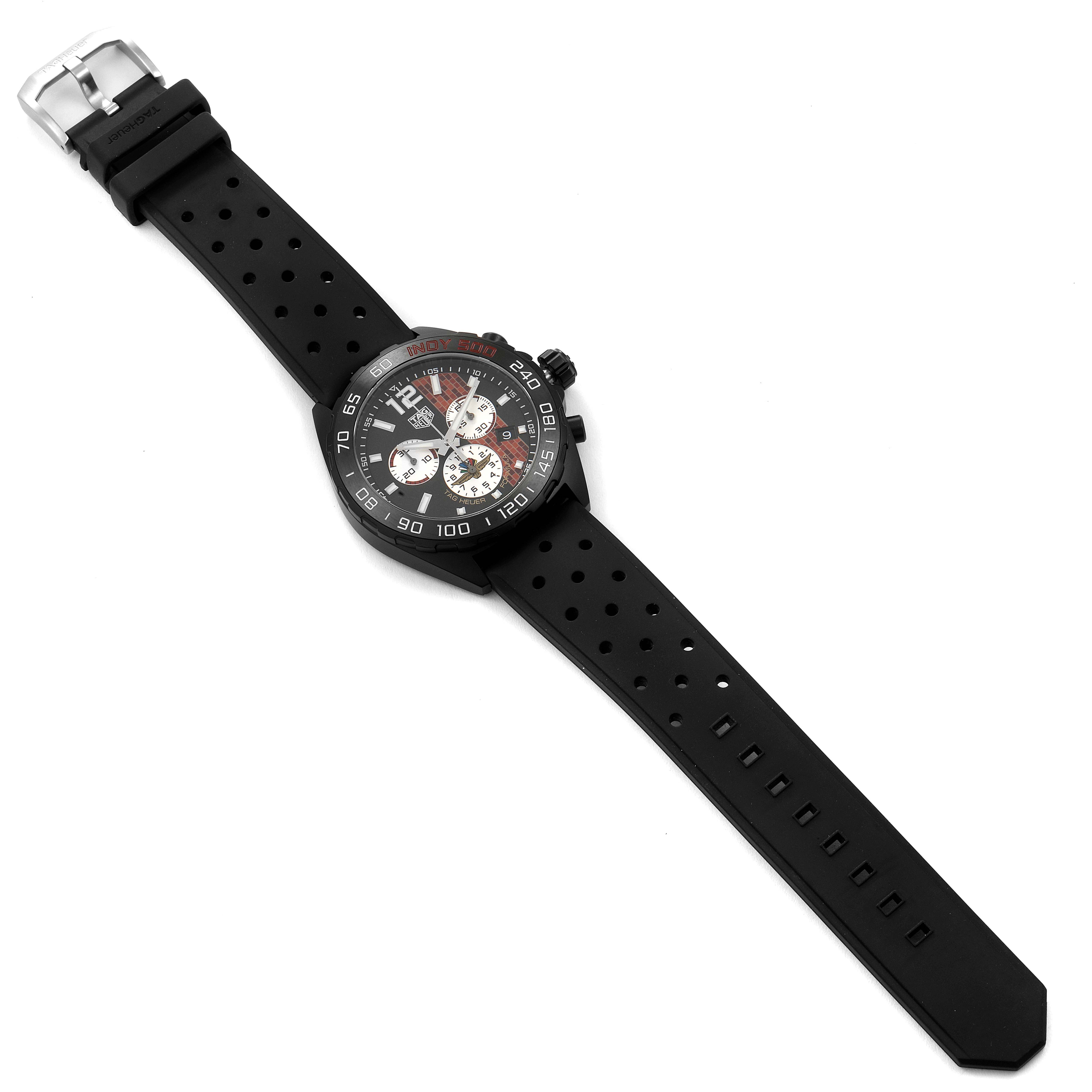 The Tag Heuer Formula 1 CAZ101AD.FT8024 Men's Stainless Steel Black Dial CAZ101AD.FT8024 Men's Stainless Steel Black Dial watch is shown at an oblique angle, highlighting its perforated black strap and face.