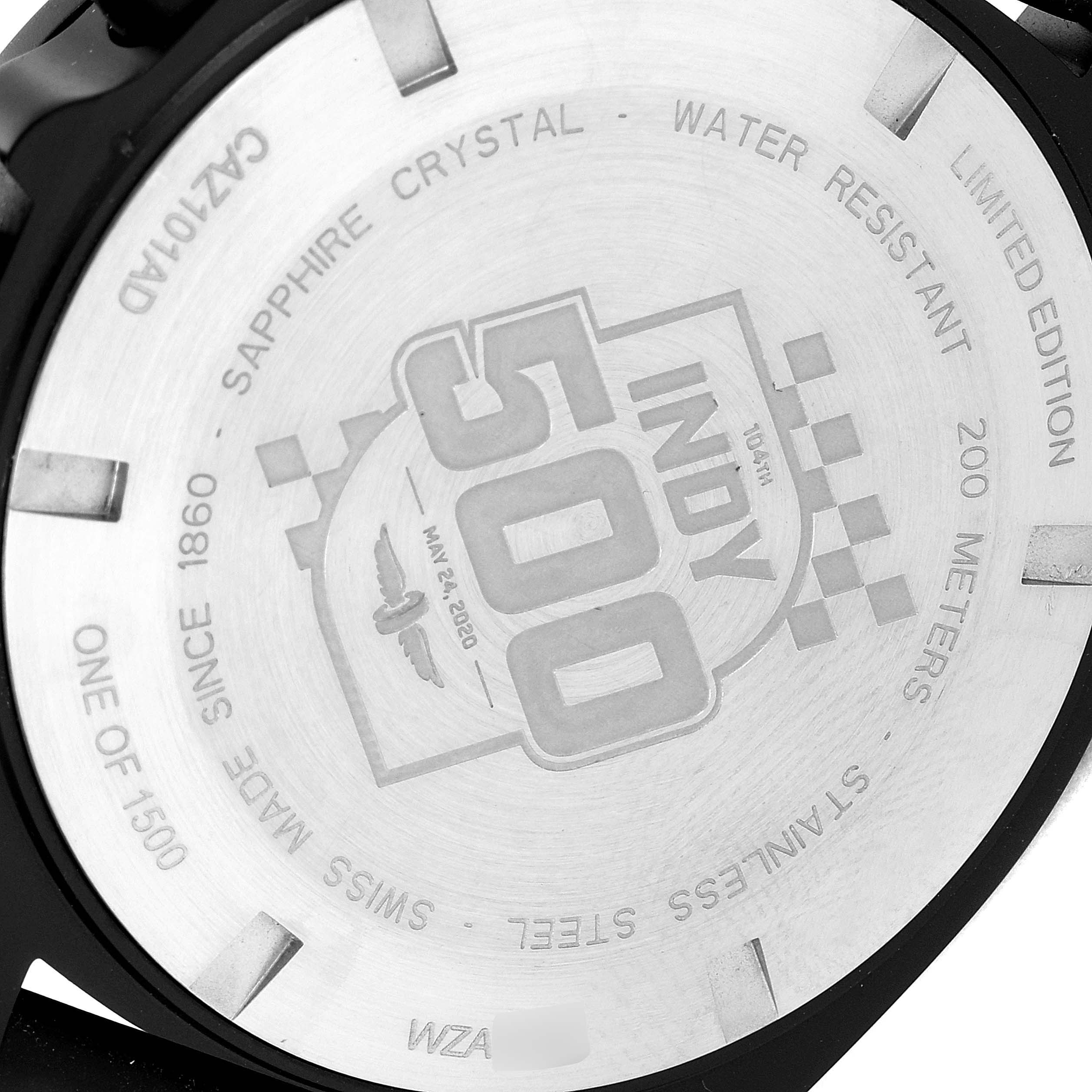 The image shows the back casing of a Tag Heuer Formula 1 CAZ101AD.FT8024 Men's Stainless Steel Black Dial CAZ101AD.FT8024 Men's Stainless Steel Black Dial Indy 500 limited edition watch, displaying branding and specs.