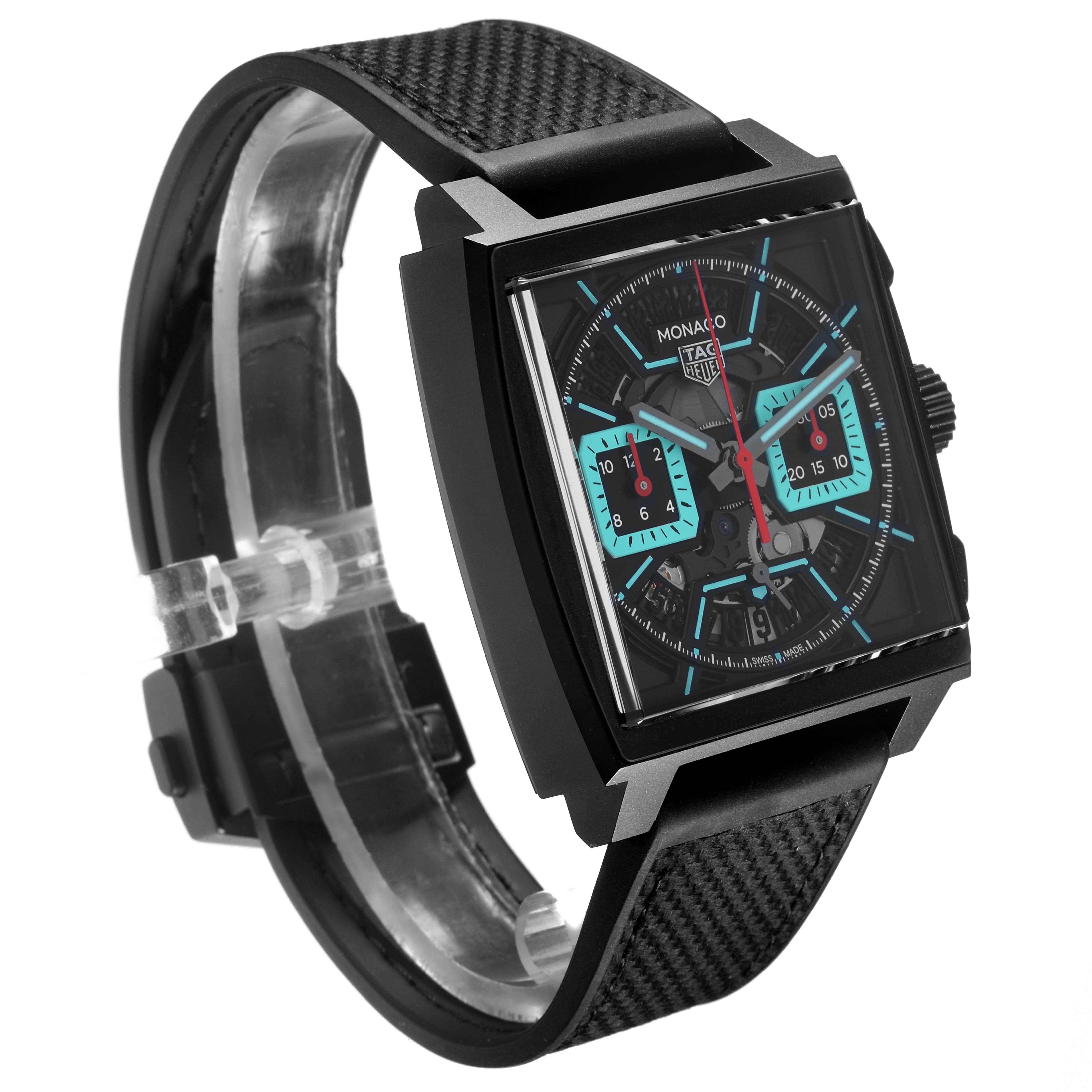 The Tag Heuer Monaco CBL2184.FT6236 Men's Titanium Black Dial CBL2184.FT6236 Men's Titanium Black Dial watch is shown in a side angle, highlighting its square face, dials, and strap.