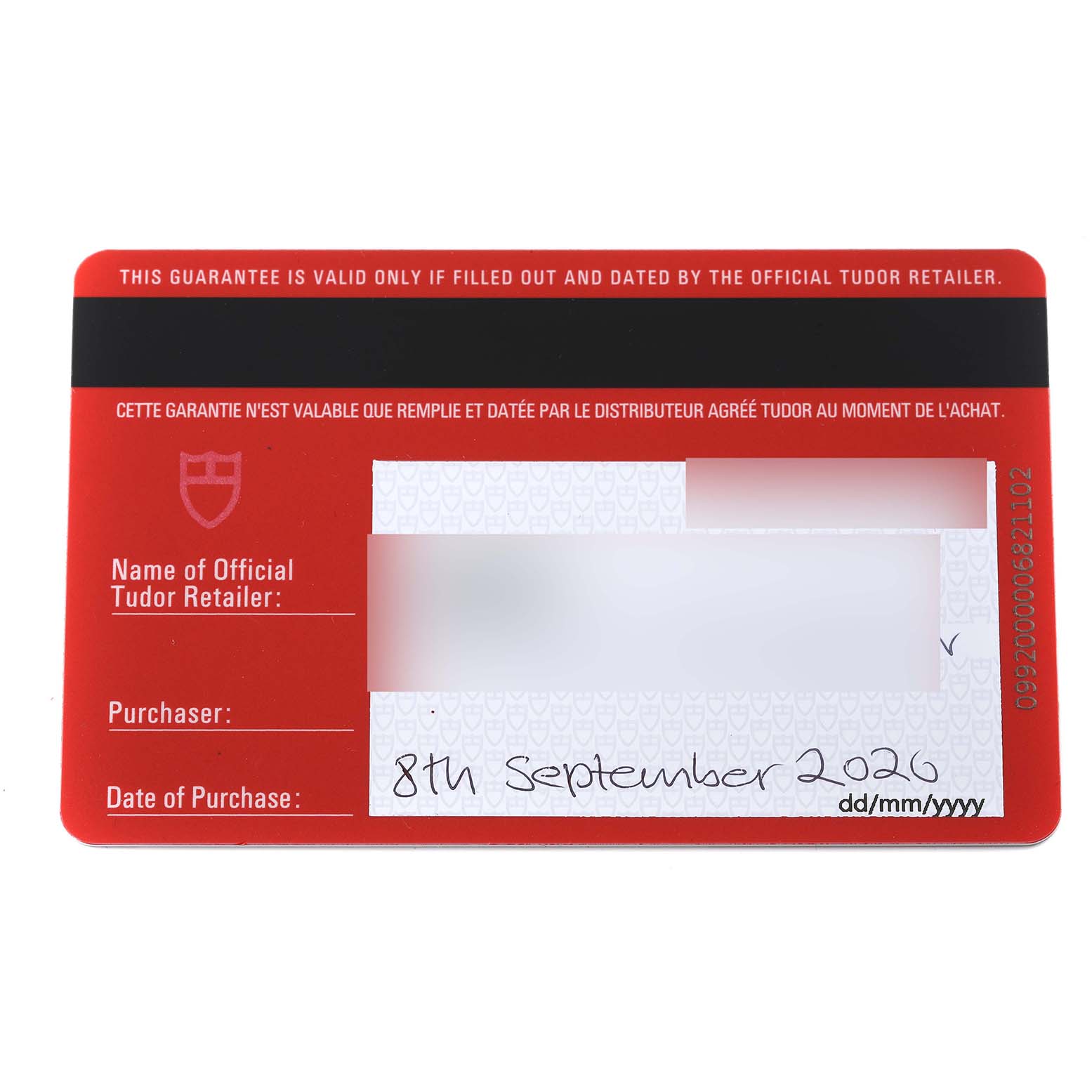 The image shows the warranty card for the Tudor Heritage Black Bay 79230G Men
s Stainless Steel Black Dial 79230G Men
s Stainless Steel Black Dial watch, displaying retailer information and purchase date.