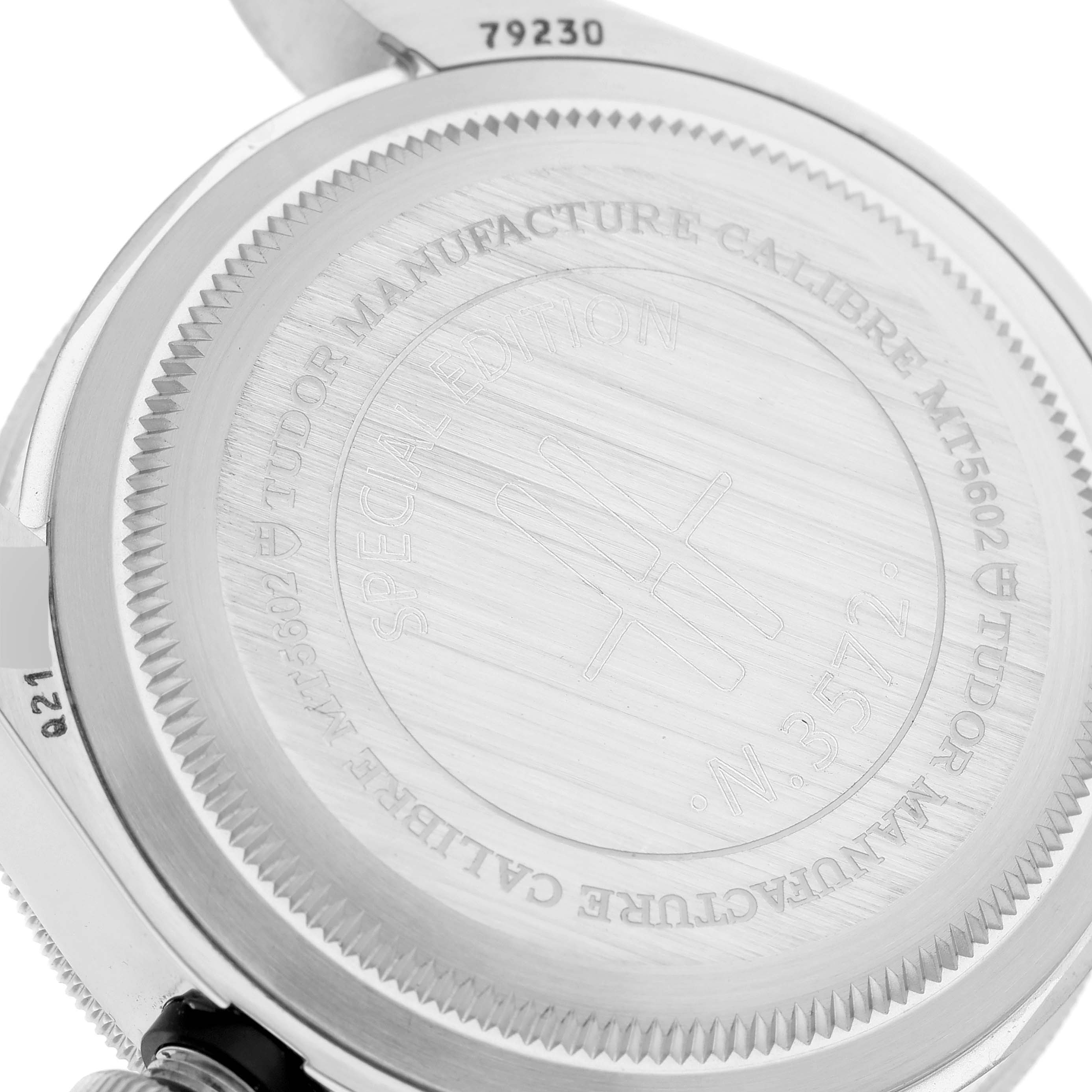 This image shows the case back of the Tudor Heritage Black Bay 79230G Men
s Stainless Steel Black Dial 79230G Men
s Stainless Steel Black Dial watch, highlighting its engravings and serial number.