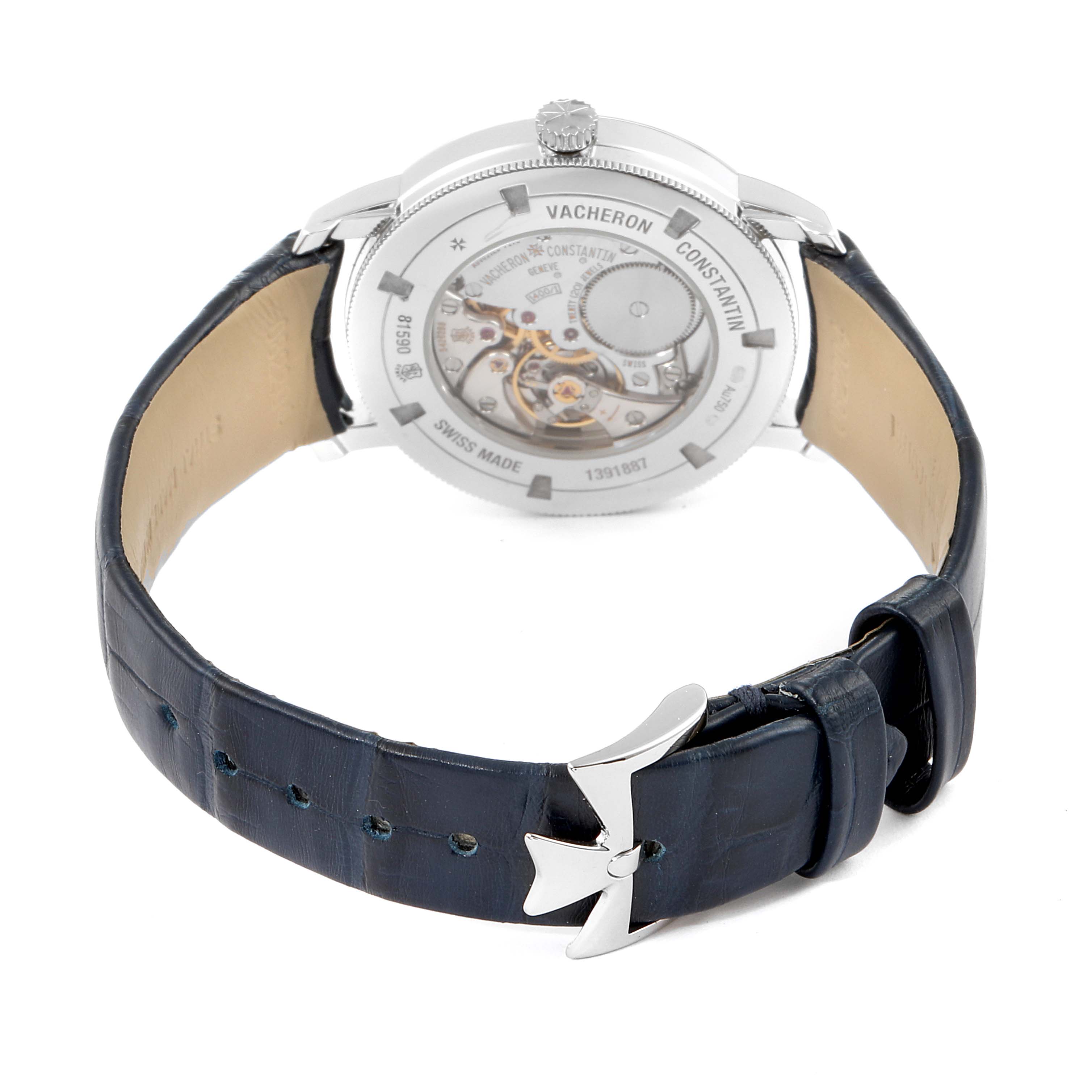 The image shows the back view of a Vacheron Constantin Traditionnelle 81590/000G-9848 Women's White Gold Silver Dial 81590/000G-9848 Women's White Gold Silver Dial watch, highlighting the movement and leather strap with a buckle.
