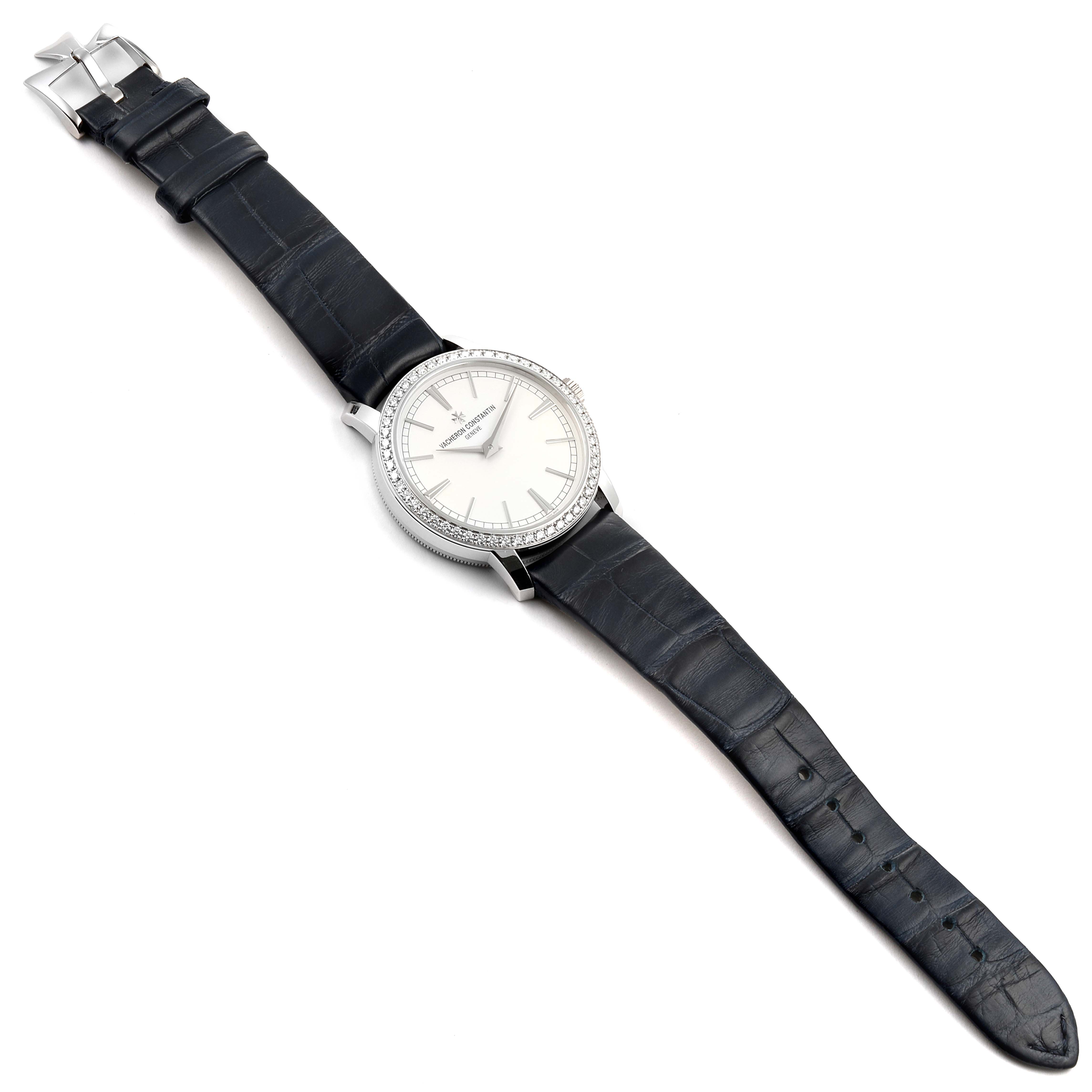 The image shows a full view of the Vacheron Constantin Traditionnelle 81590/000G-9848 Women's White Gold Silver Dial 81590/000G-9848 Women's White Gold Silver Dial watch, including its dial, case, and leather strap from an overhead angle.