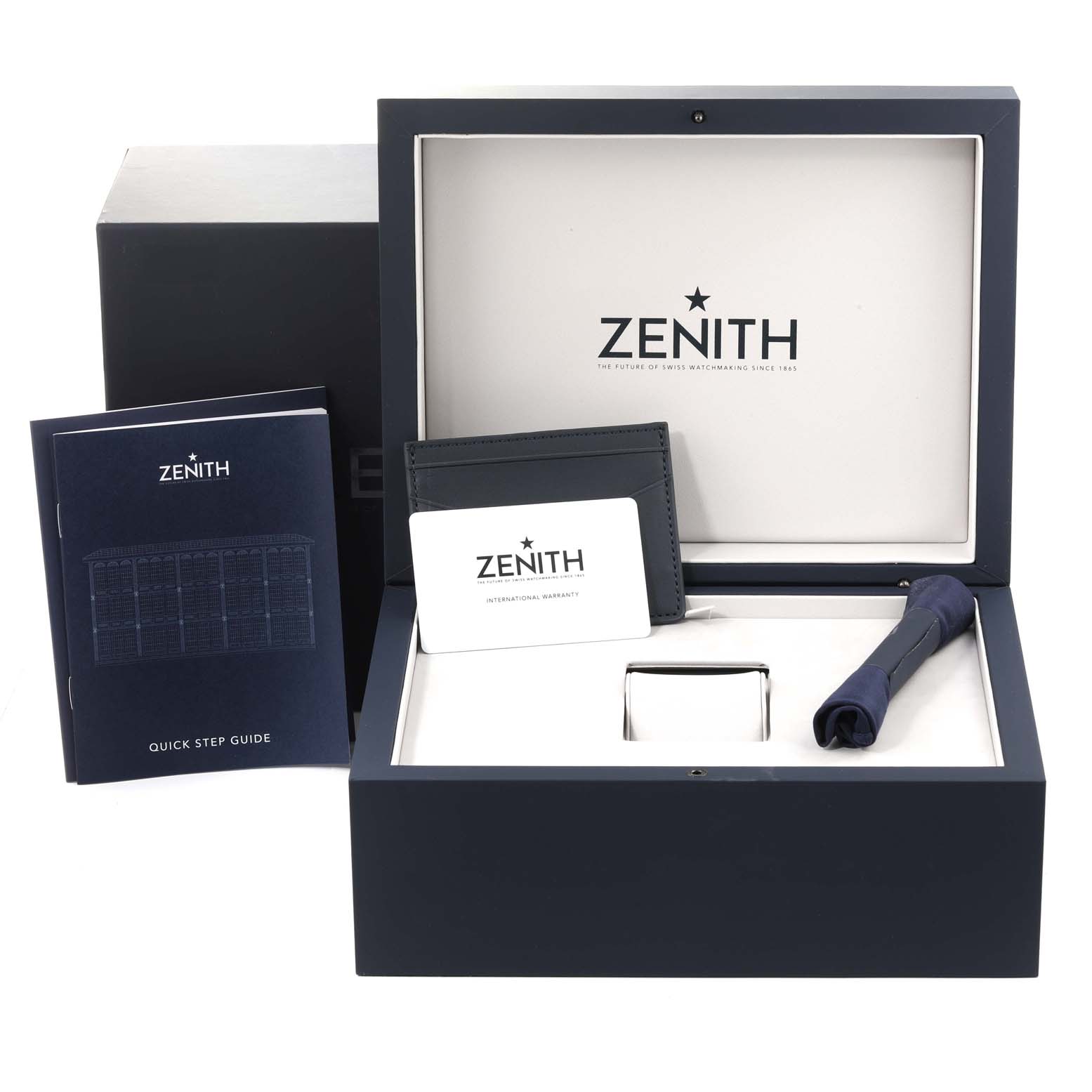 The image shows a Zenith Chronomaster 03.3103.3600/69.M3100 Men's Stainless Steel Silver Dial 03.3103.3600/69.M3100 Men's Stainless Steel Silver Dial watch box set including a quick step guide, authenticity card, and watch strap.