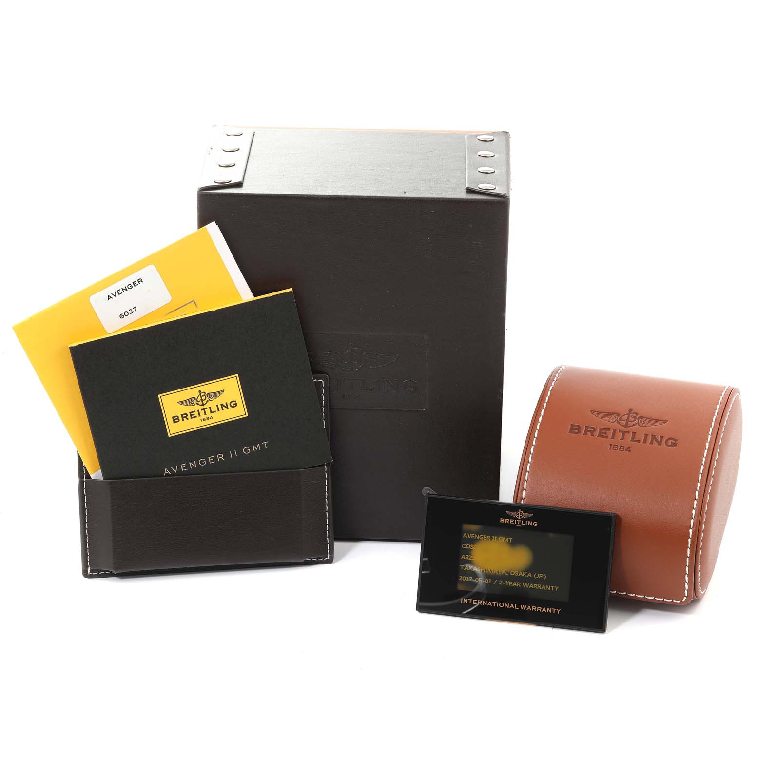 The image shows a Breitling Avenger A32390 Men's Stainless Steel Blue Dial A32390 Men's Stainless Steel Blue Dial watch box, warranty card, manuals, and a leather watch case.