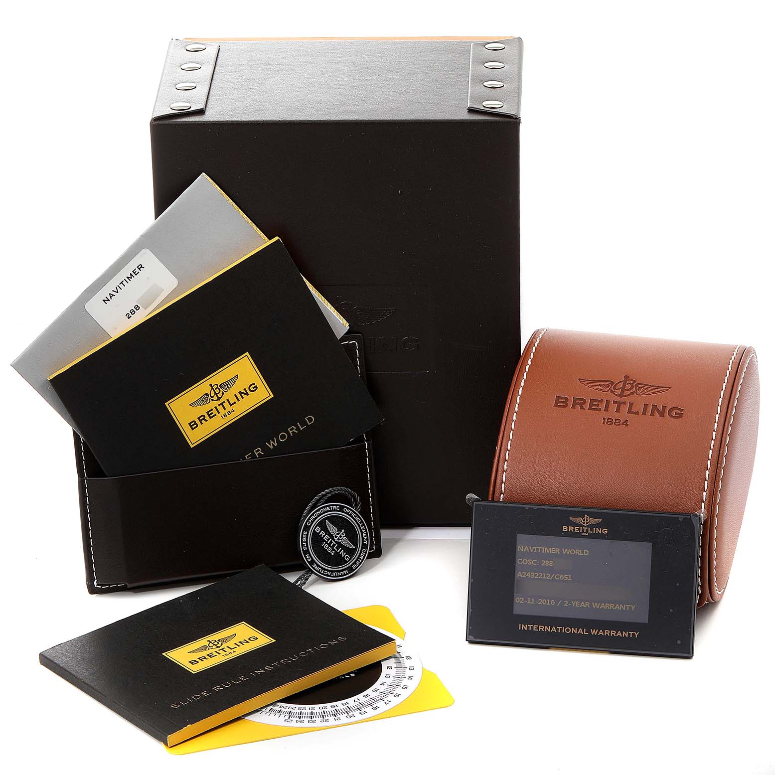 The image shows Breitling Navitimer A24322 Men's Stainless Steel Blue Dial A24322 Men's Stainless Steel Blue Dial watch accessories, including the box, manuals, warranty card, and carrying case from a frontal angle.