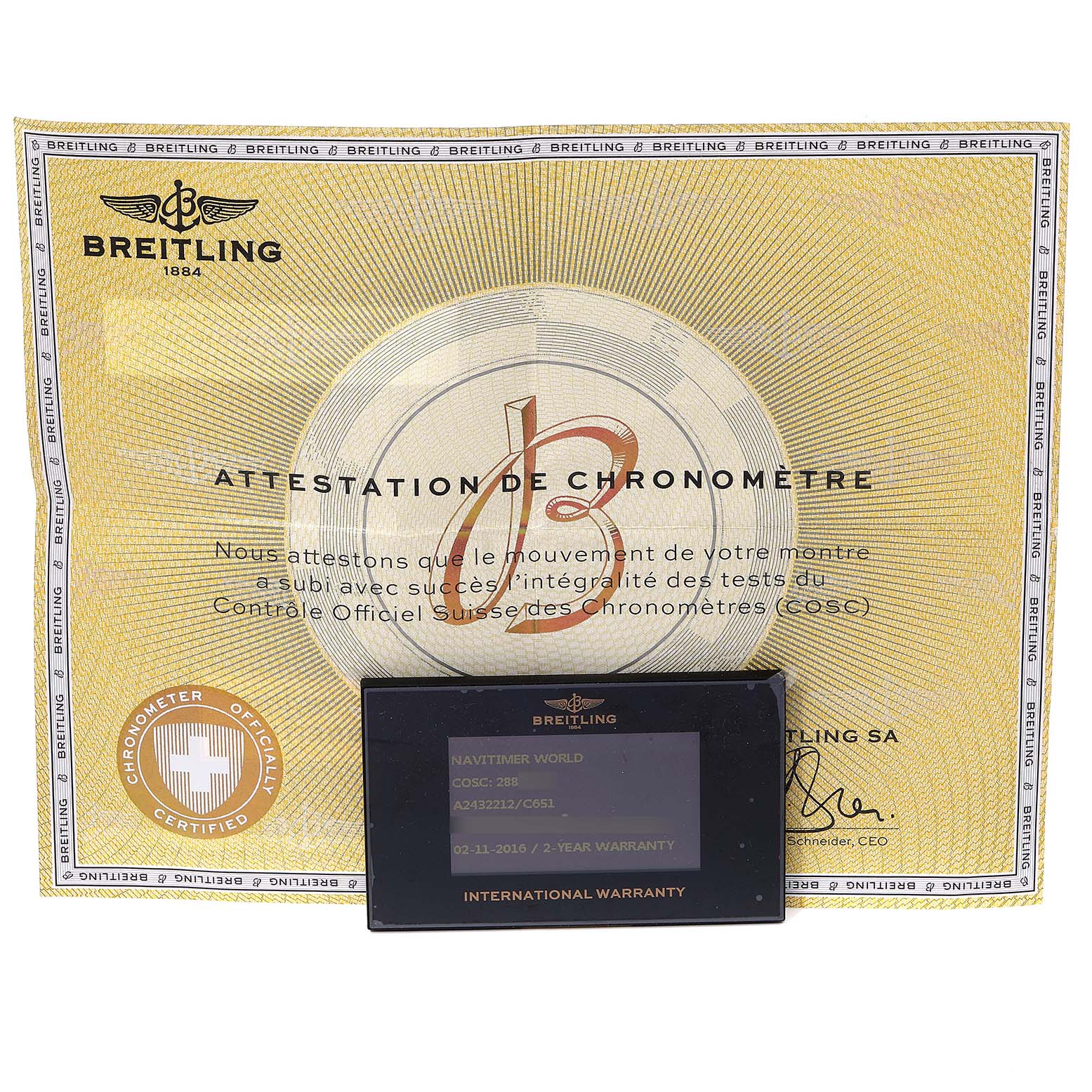 The image shows a Breitling Navitimer A24322 Men's Stainless Steel Blue Dial A24322 Men's Stainless Steel Blue Dial model certificate of authenticity and an international warranty card from a top-down angle.