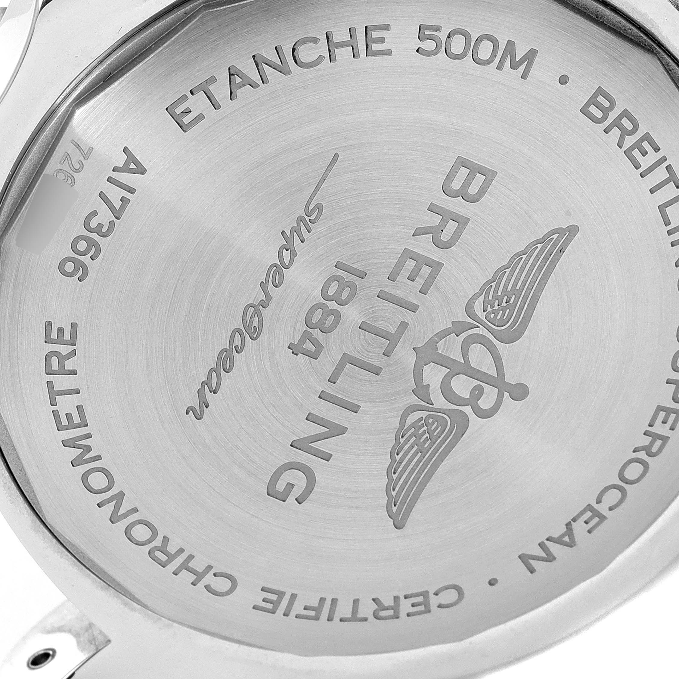 The image shows the back case of a Breitling Superocean A17366 Men's Stainless Steel Orange Dial A17366 Men's Stainless Steel Orange Dial watch, highlighting the branding and specifications.