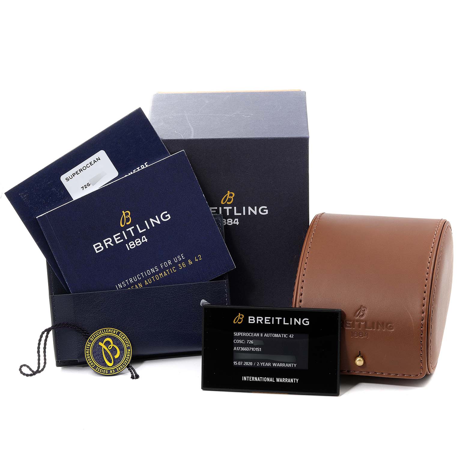 The image shows a Breitling Superocean A17366 Men's Stainless Steel Orange Dial A17366 Men's Stainless Steel Orange Dial watch box, instructions, warranty card, tag, and leather carrying case from a front angle.