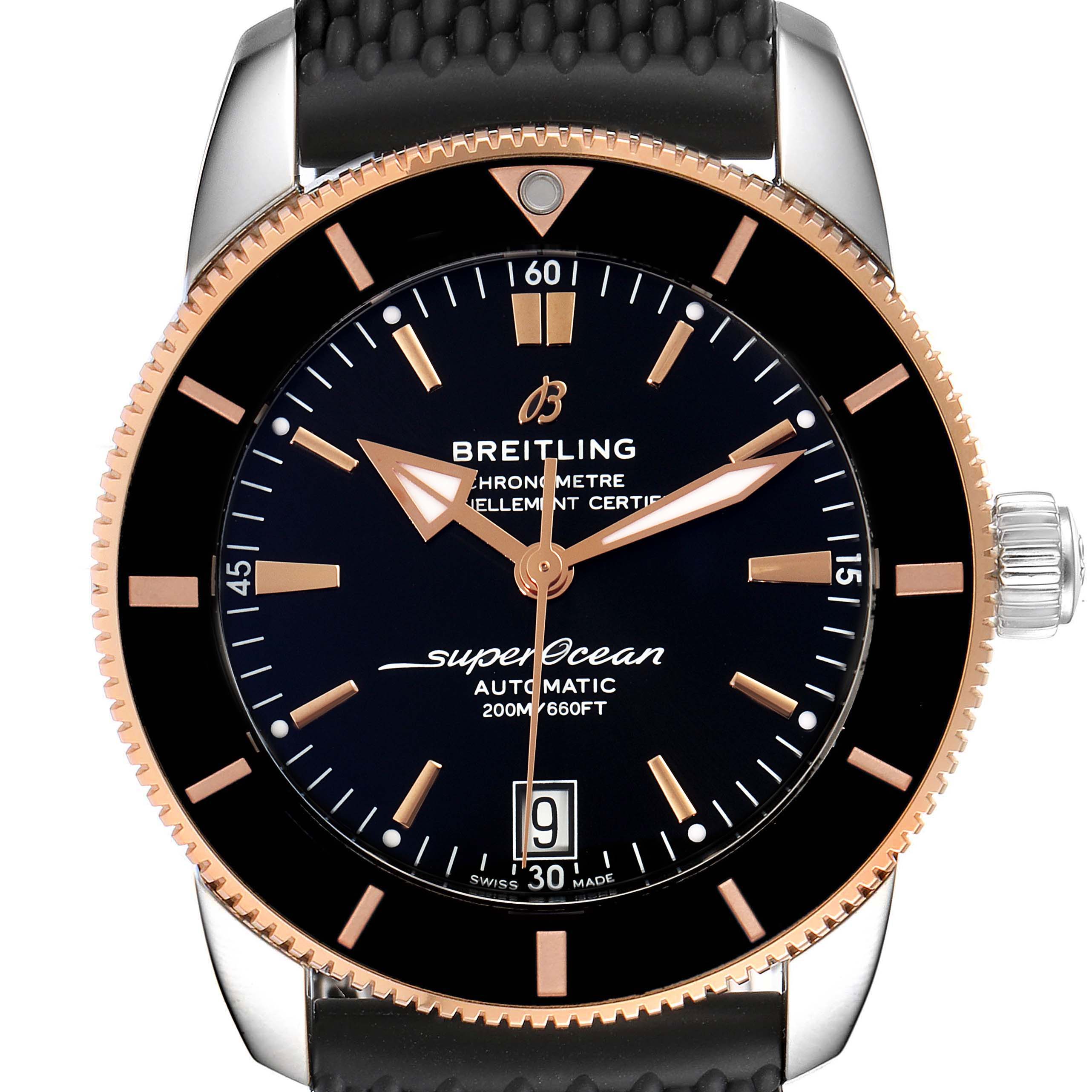 The image shows a close-up front view of a Breitling Superocean UB201012/BG53/154A Men's Steel and Gold (two tone) Black Dial UB201012/BG53/154A Men's Steel and Gold (two tone) Black Dial watch, highlighting its dial, bezel, and part of the strap.