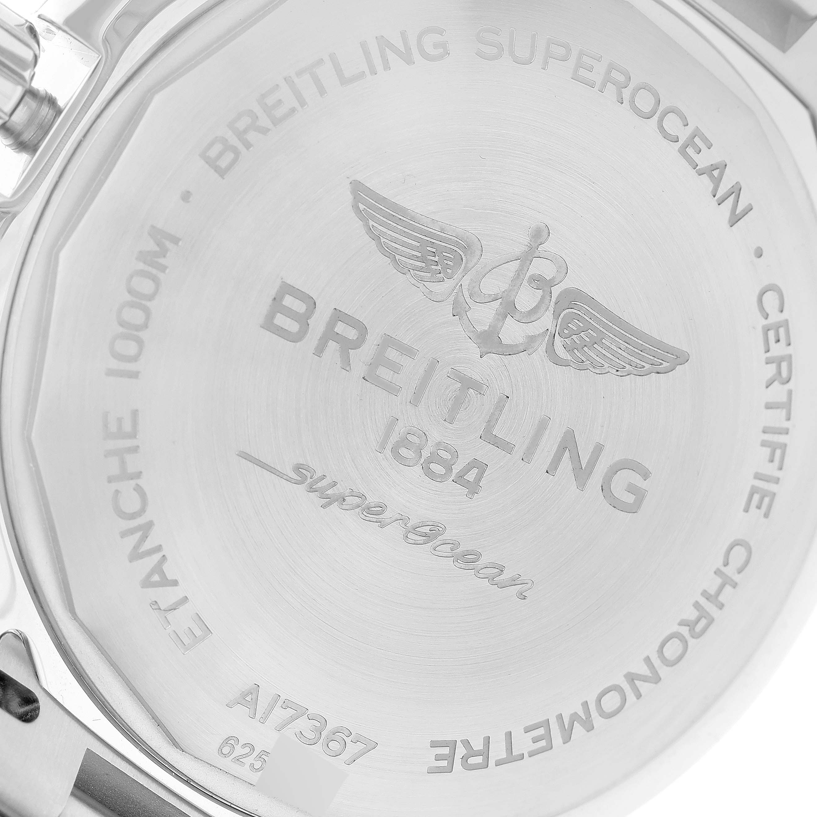 The image shows a close-up of the back case of a Breitling Superocean A17367D Men's Stainless Steel Blue Dial A17367D Men's Stainless Steel Blue Dial watch, displaying brand engravings and model details.