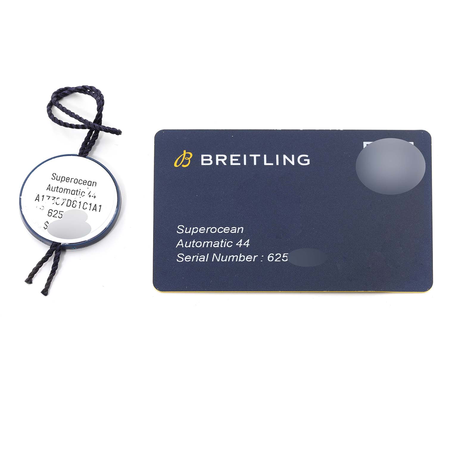 The image shows the tag and warranty card for the Breitling Superocean A17367D Men's Stainless Steel Blue Dial A17367D Men's Stainless Steel Blue Dial Automatic 44.